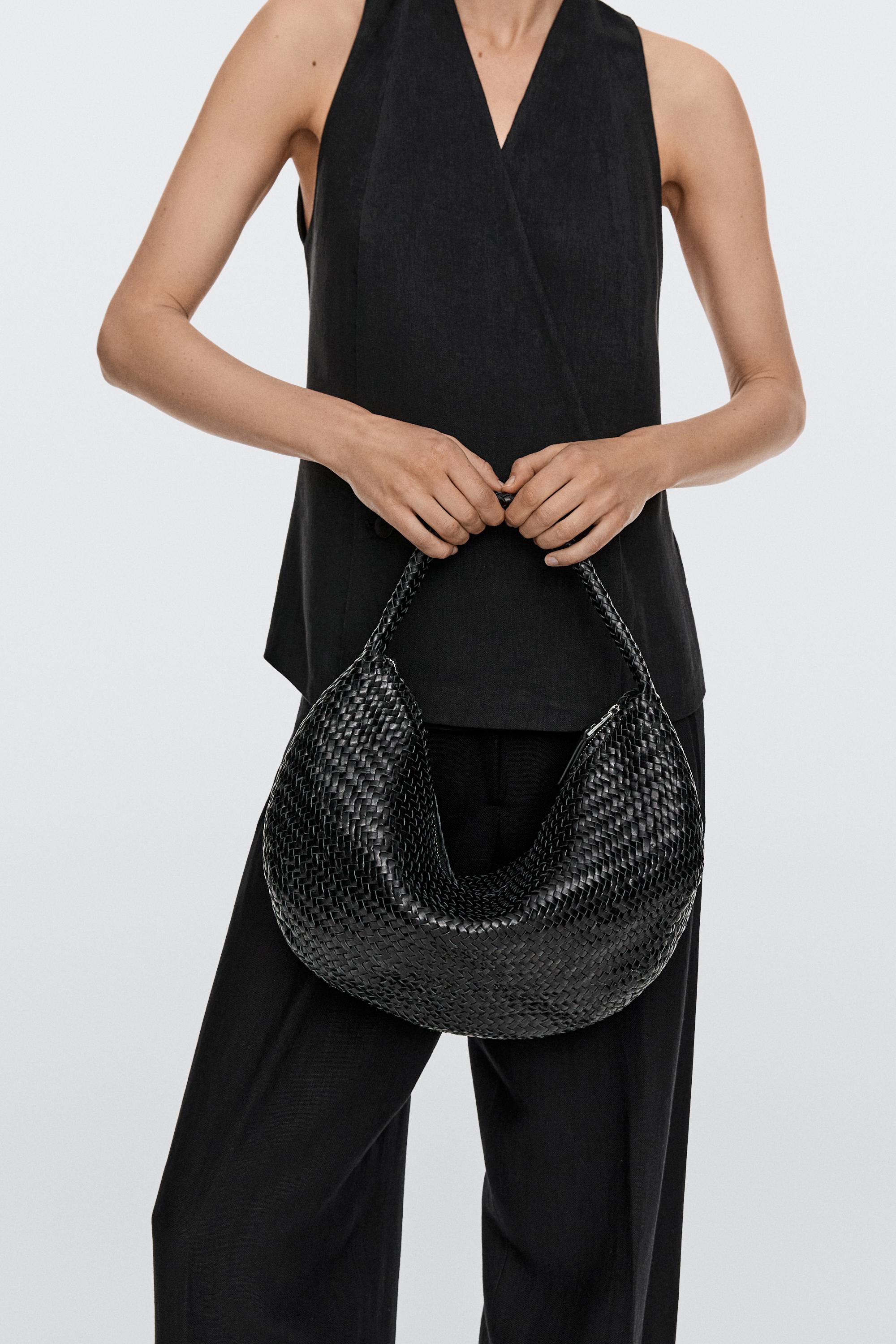 Braided leather half-moon bag — BLACK