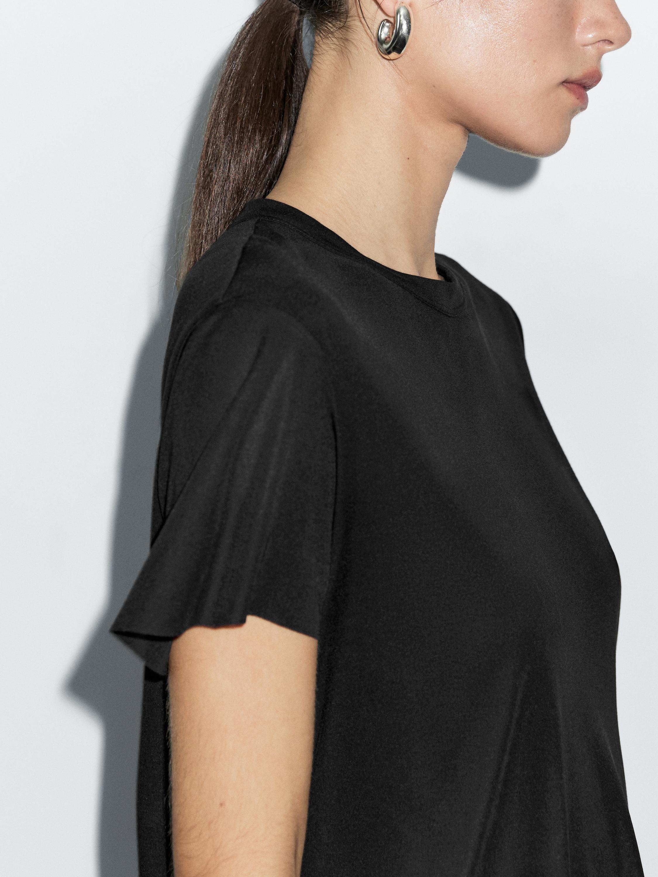 تيشرت فضفاض بأكمام قصيرة