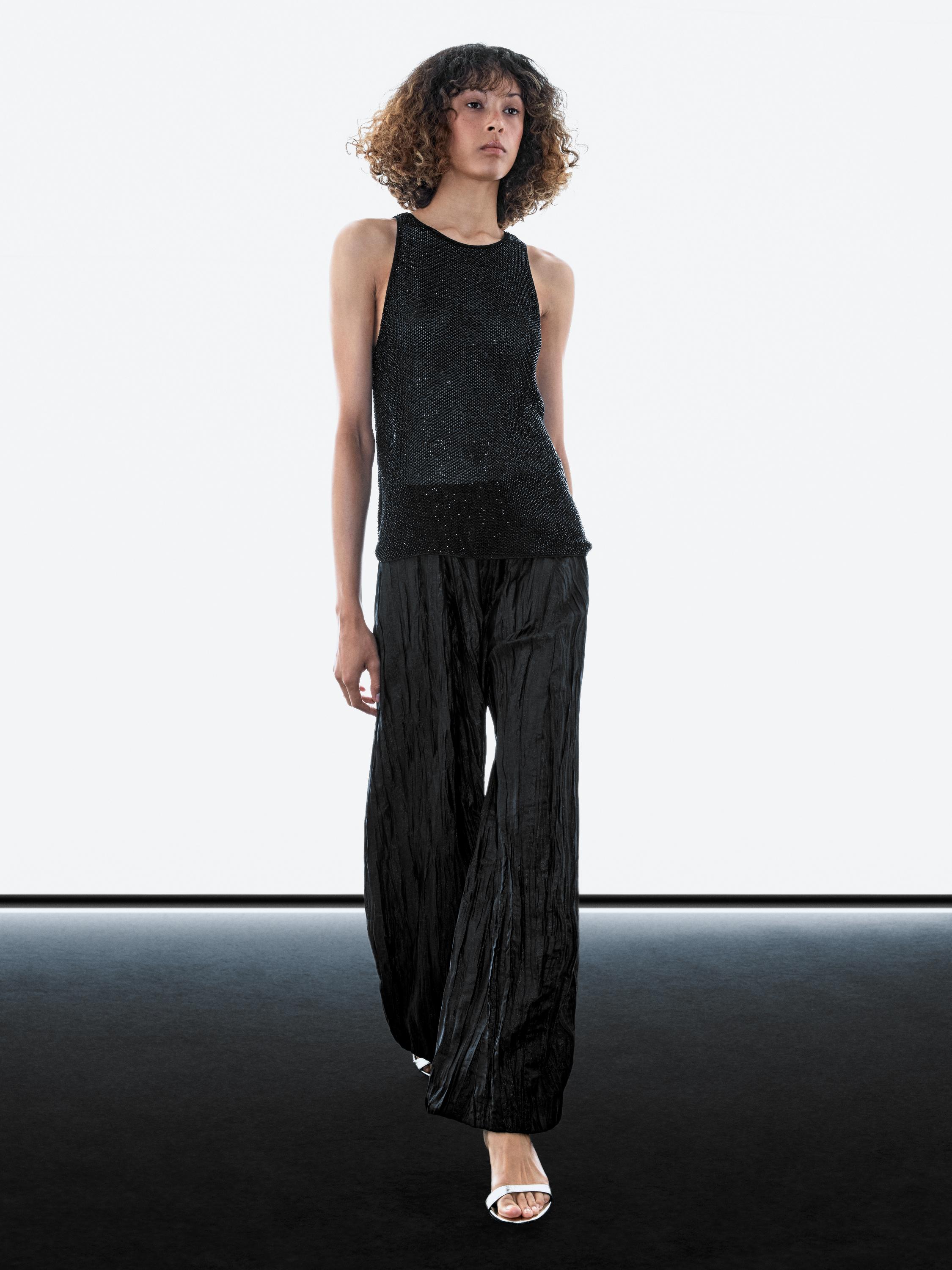 Creased pleated-effect wide-leg trousers
