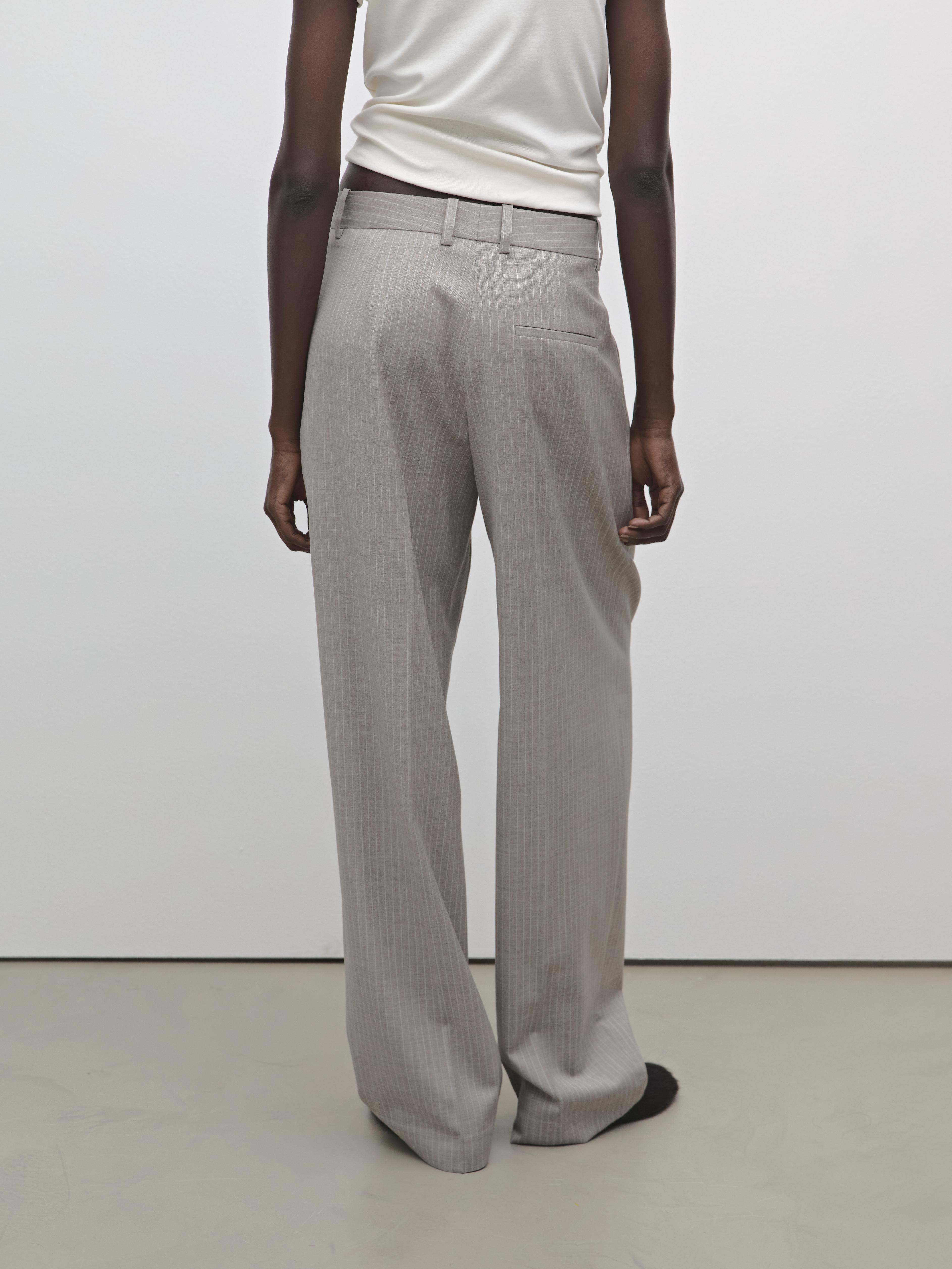 Pleated pinstripe trousers