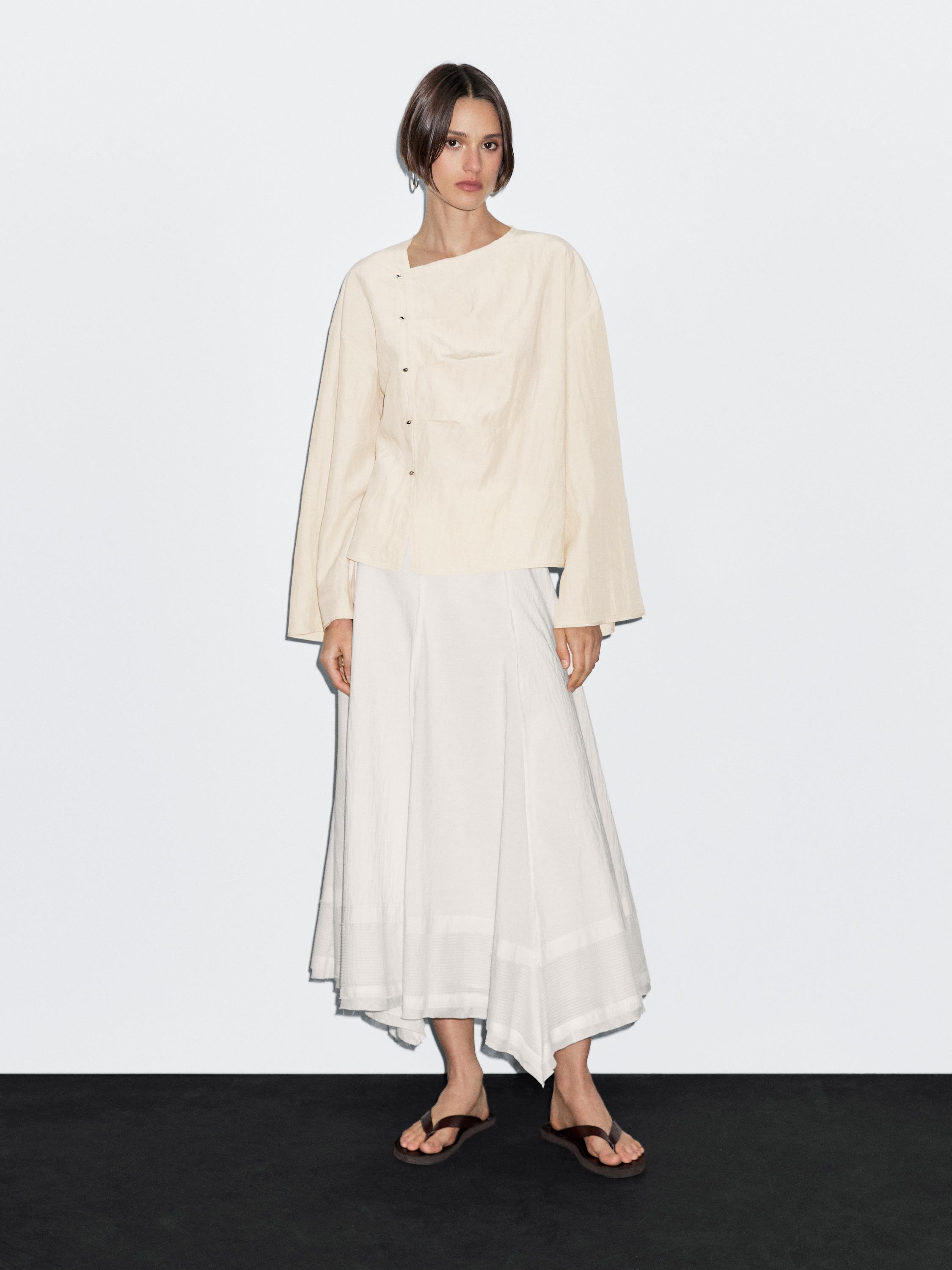 Blusa manga larga botonadura lateral