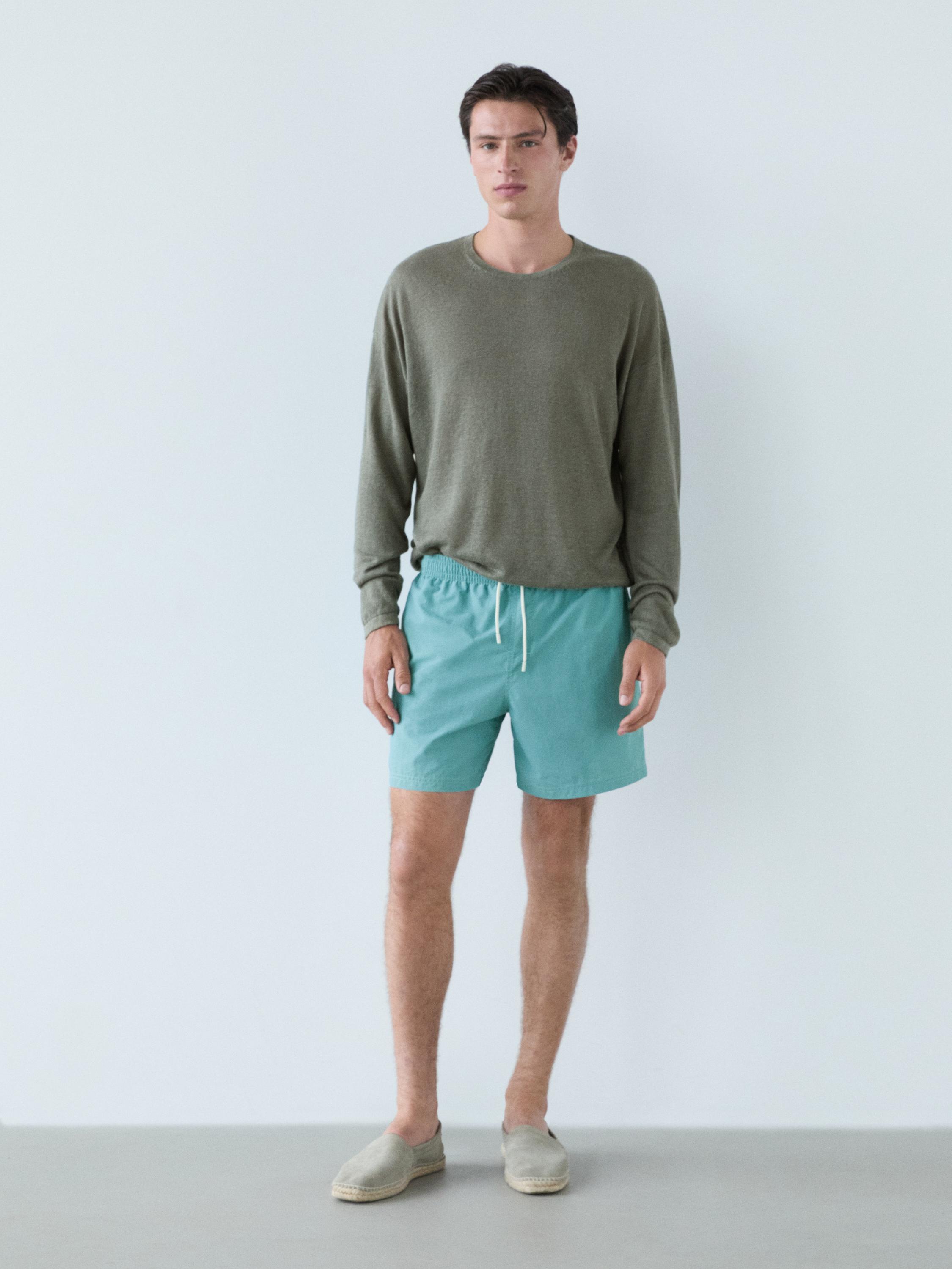 Plain pigment swimming trunks