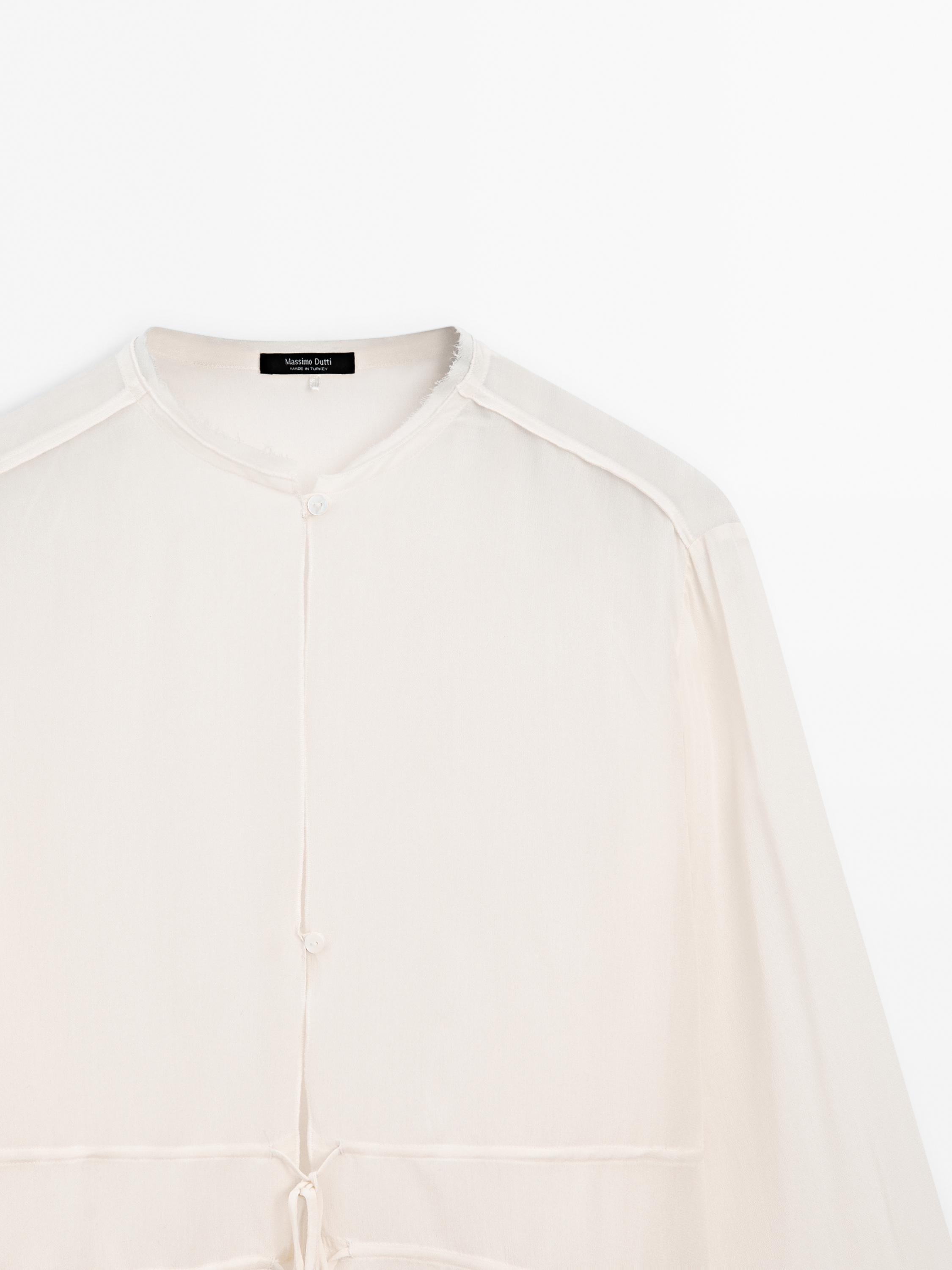 Flowing semi-sheer blouse with ties