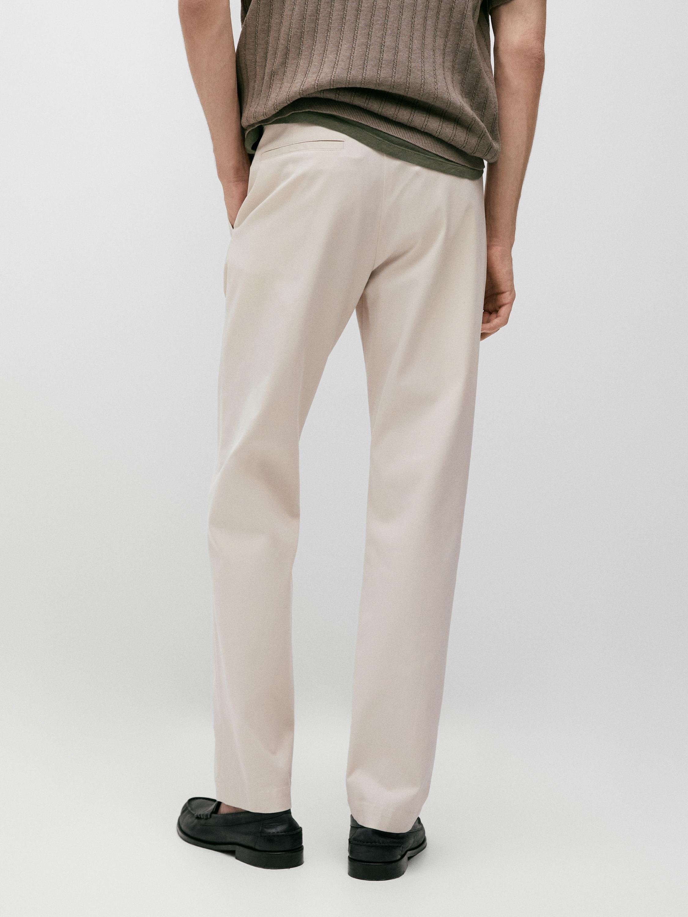 Cotton blend tapered fit trousers — BEIGE