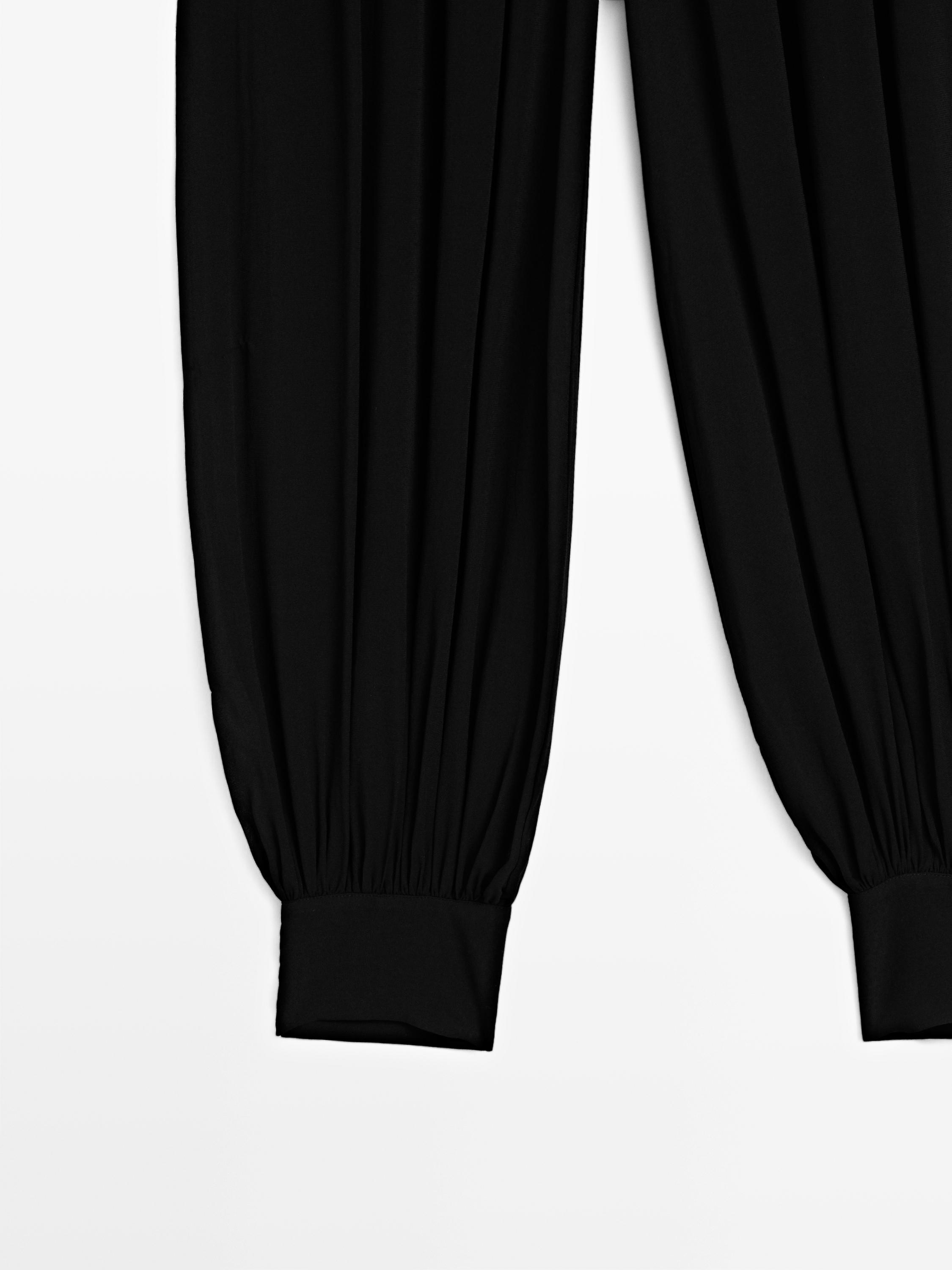 Semi-sheer sarouel trousers with button details — BLACK