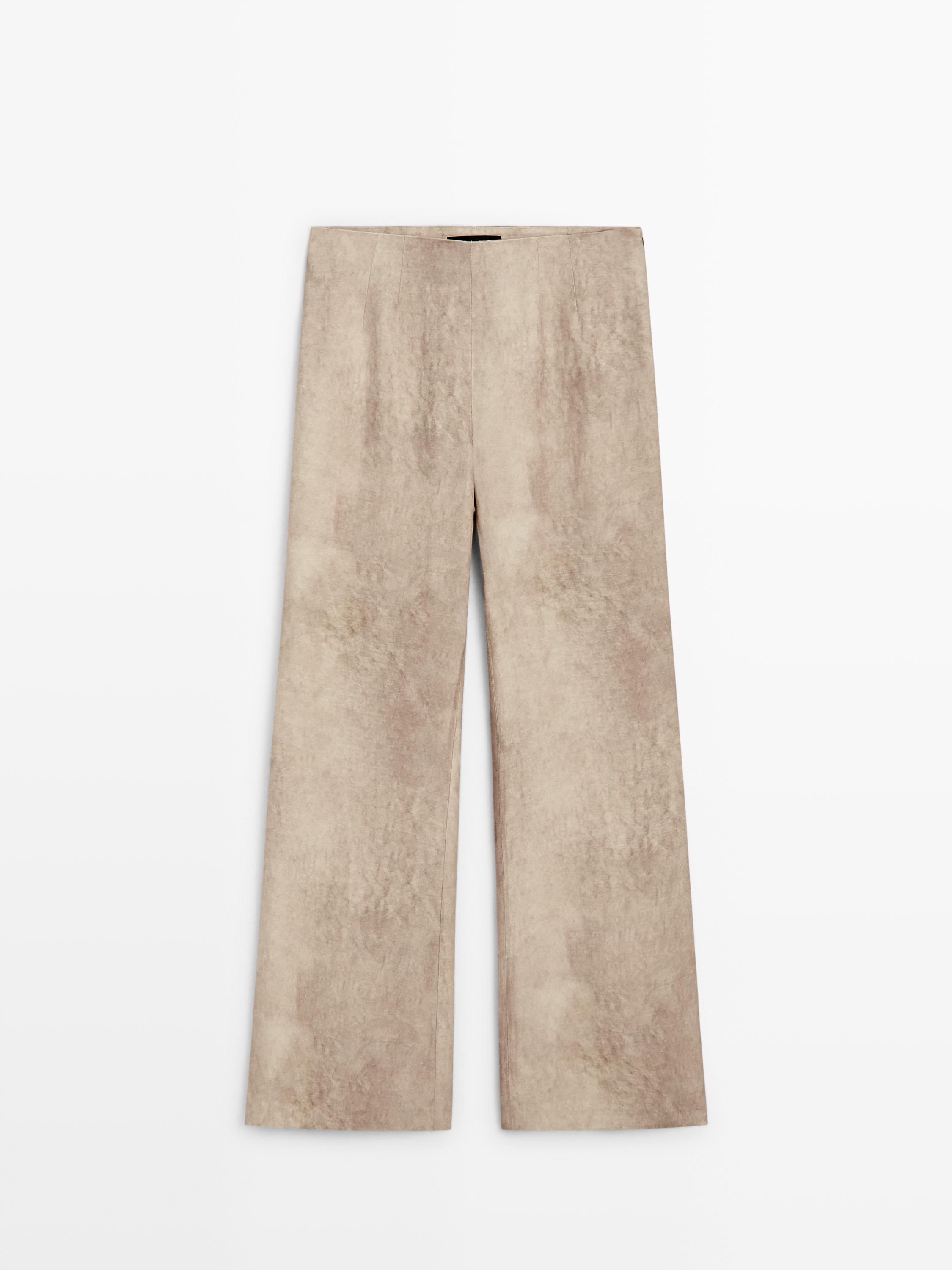 Pantalón fluido efecto desgastado