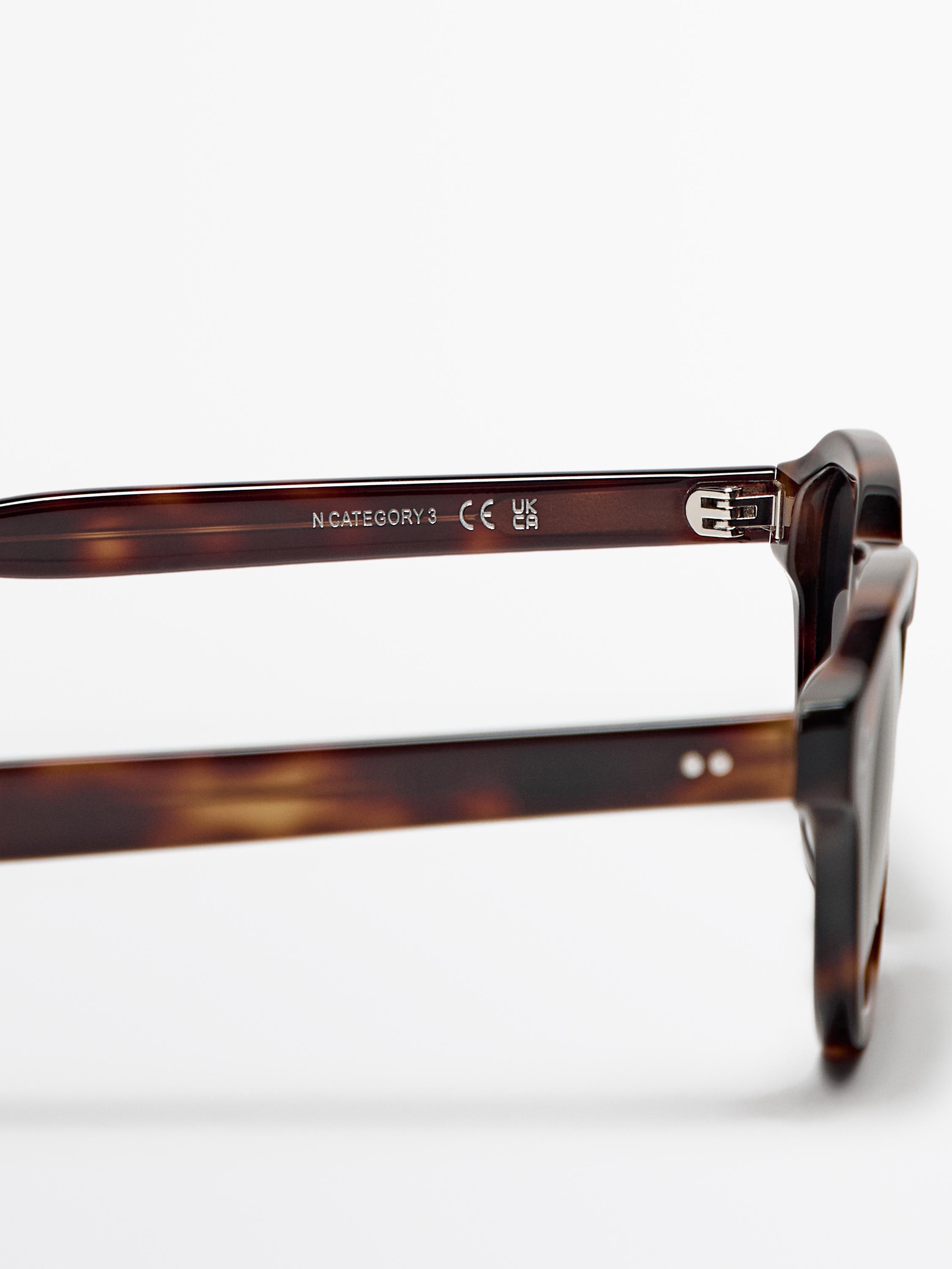 Round tortoiseshell-effect sunglasses