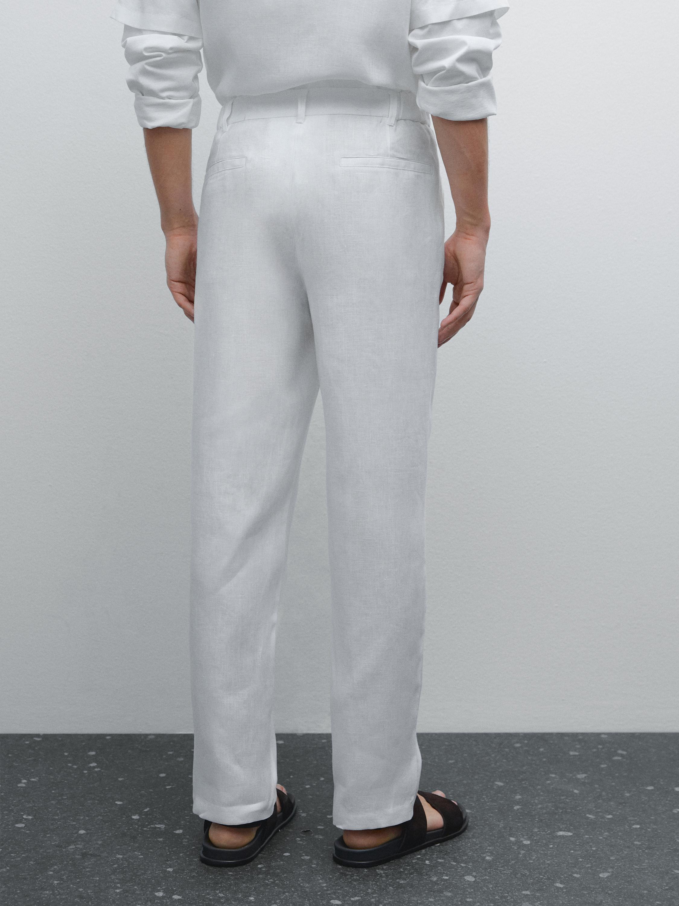 Pantalón tapered fit 100% lino