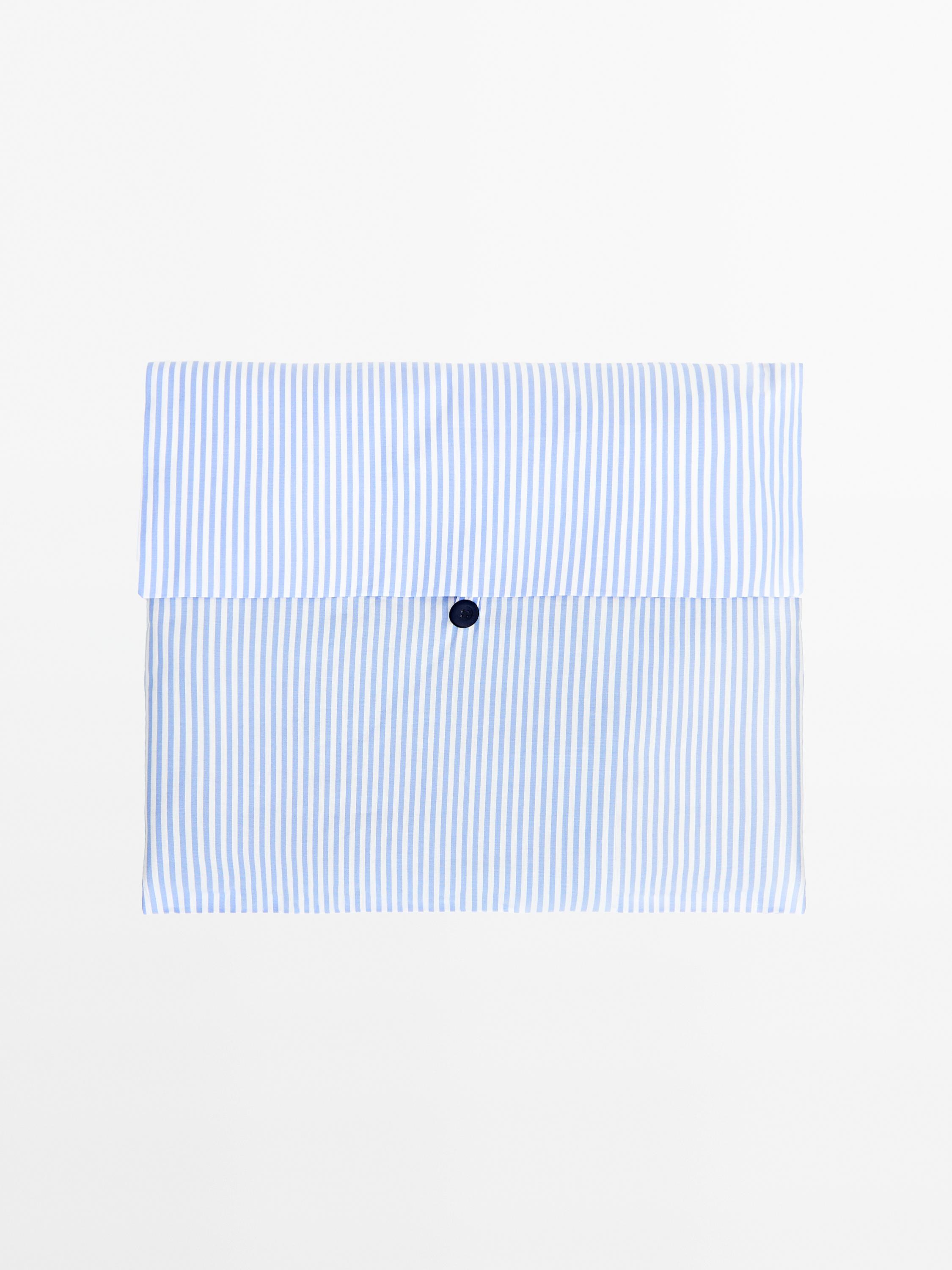 Short sleeve pyjama top and striped trousers