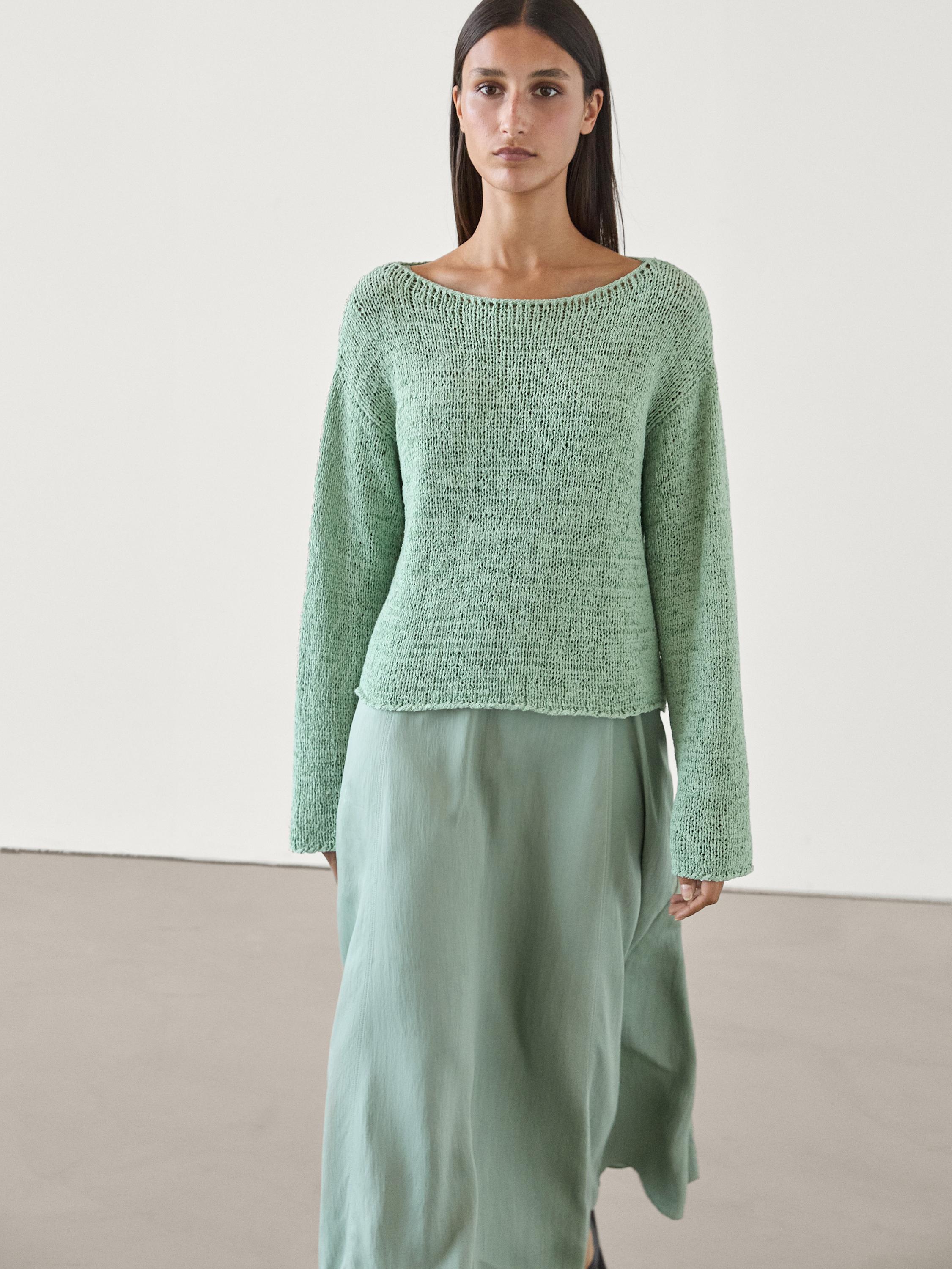 Flecked knit sweater with boat neck