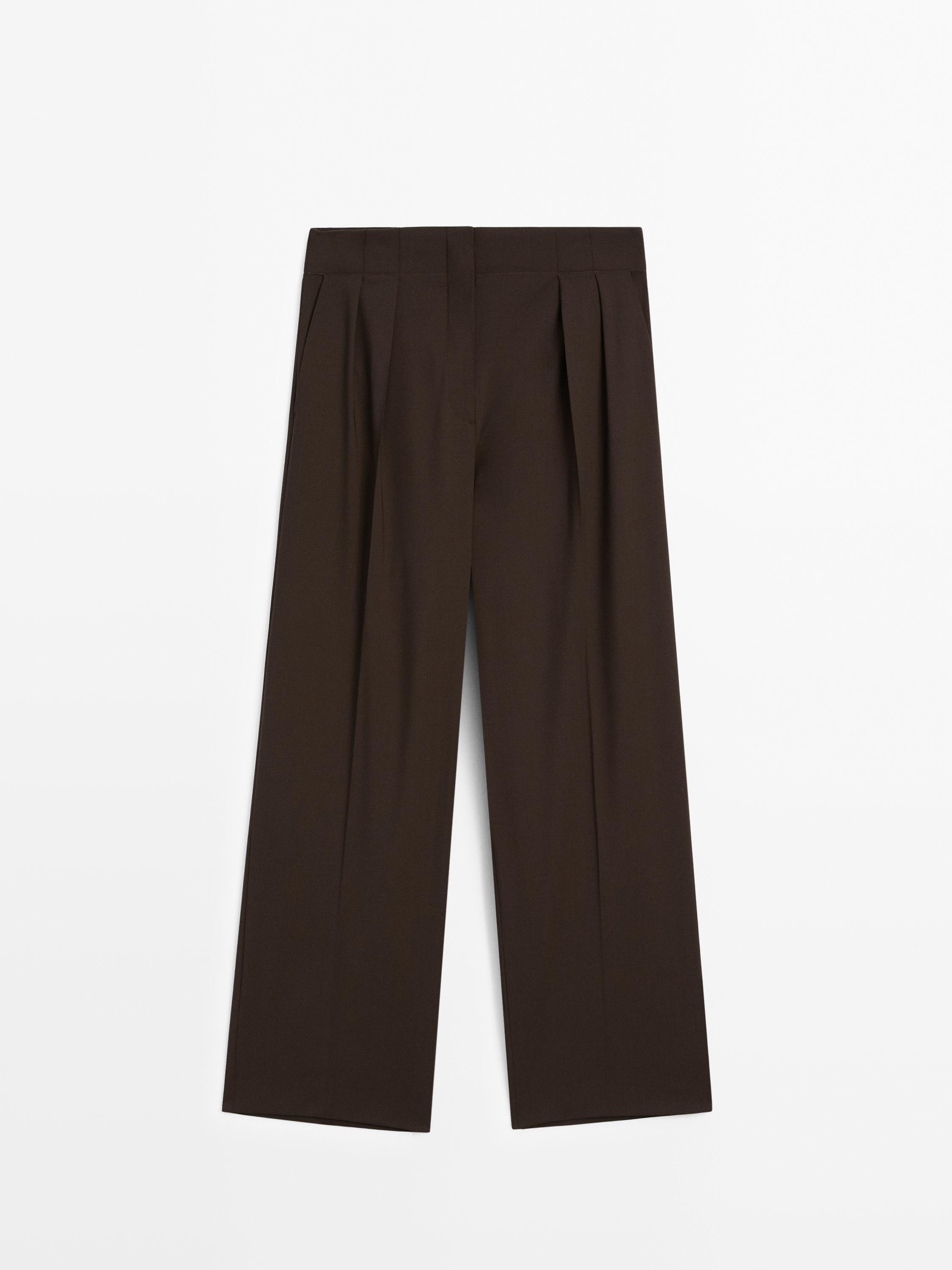 Pantalon boîte blanche plissé