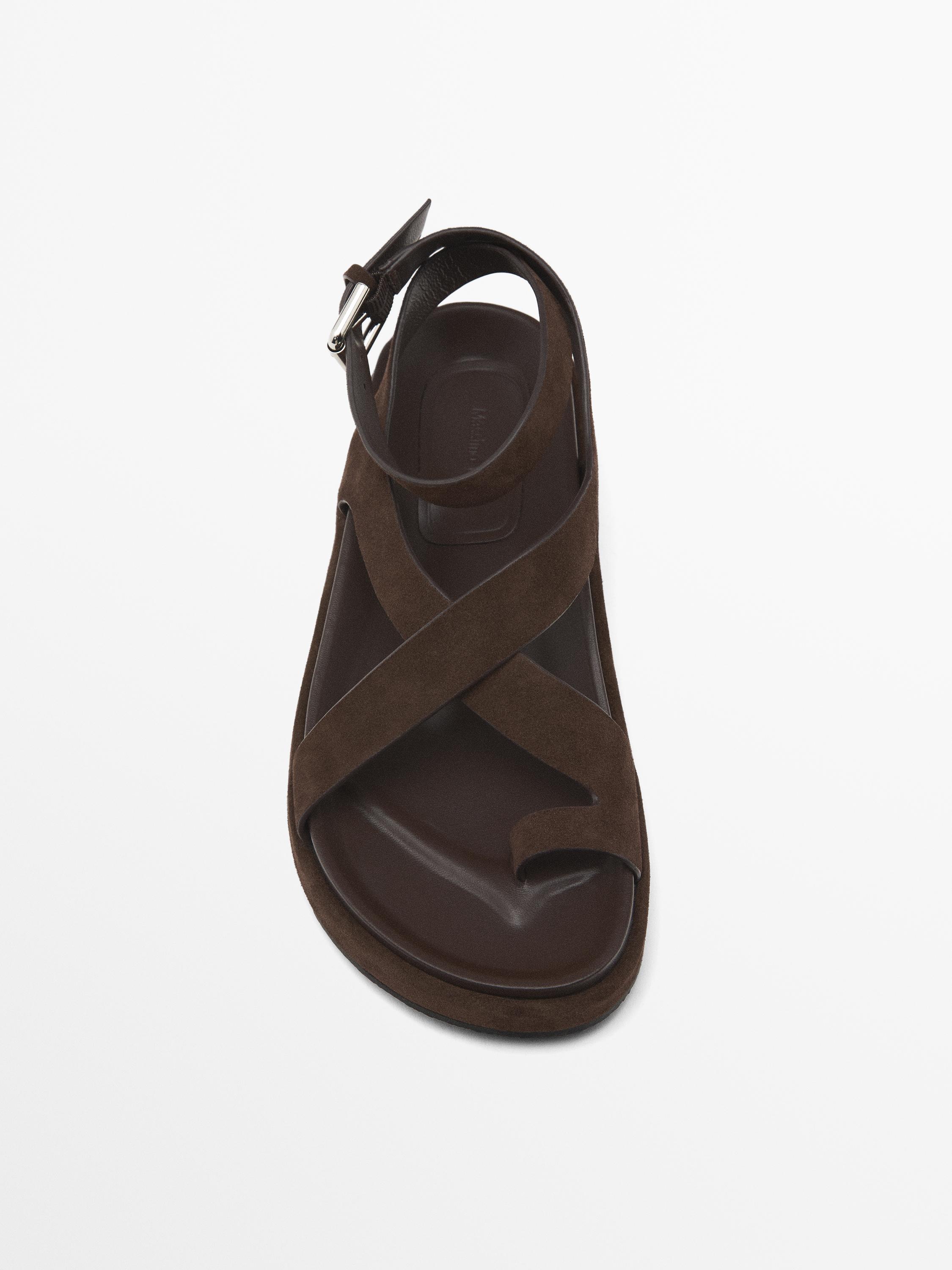 Sandals with crossover straps