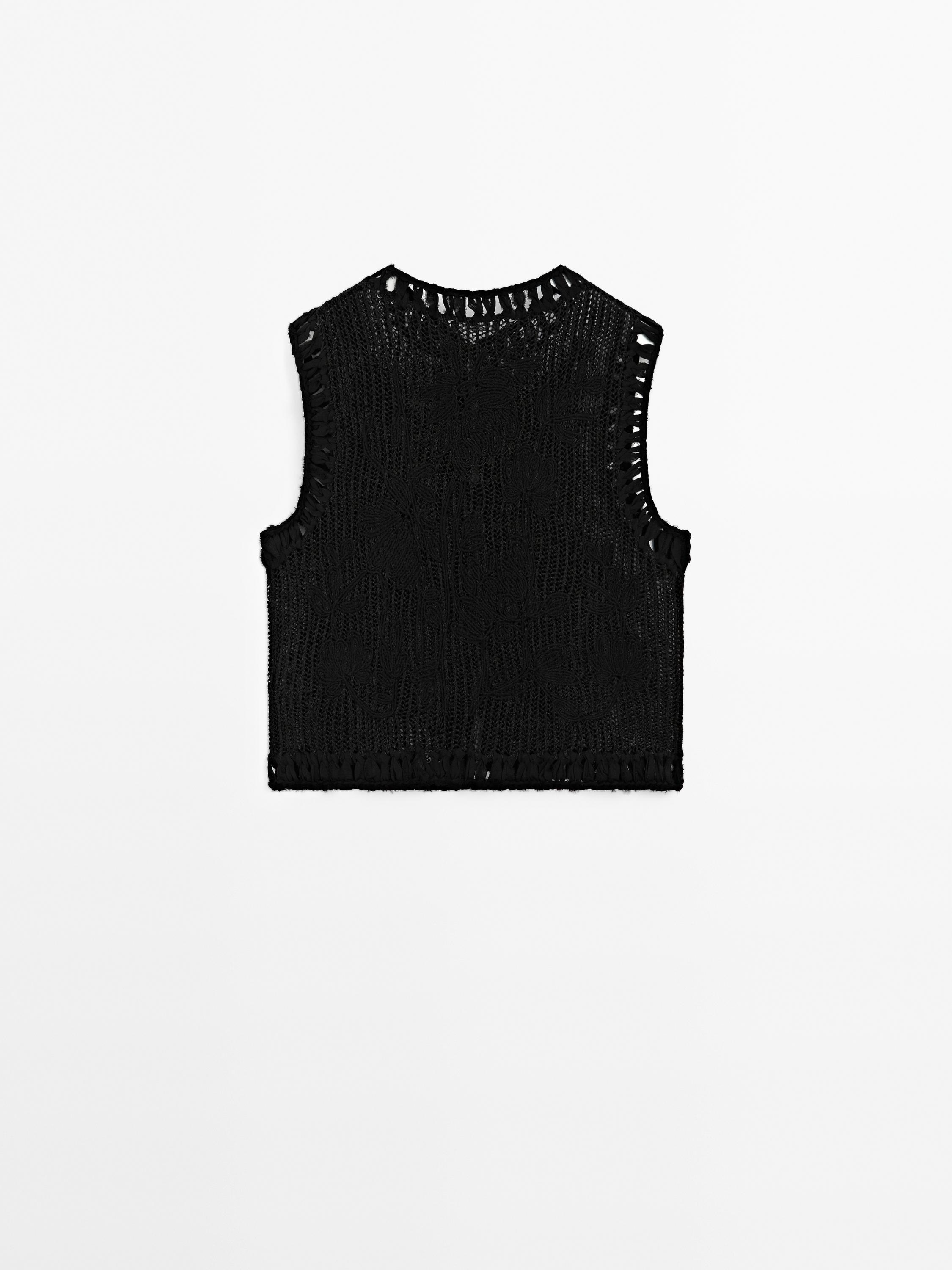 Knit vest with embroidered detail