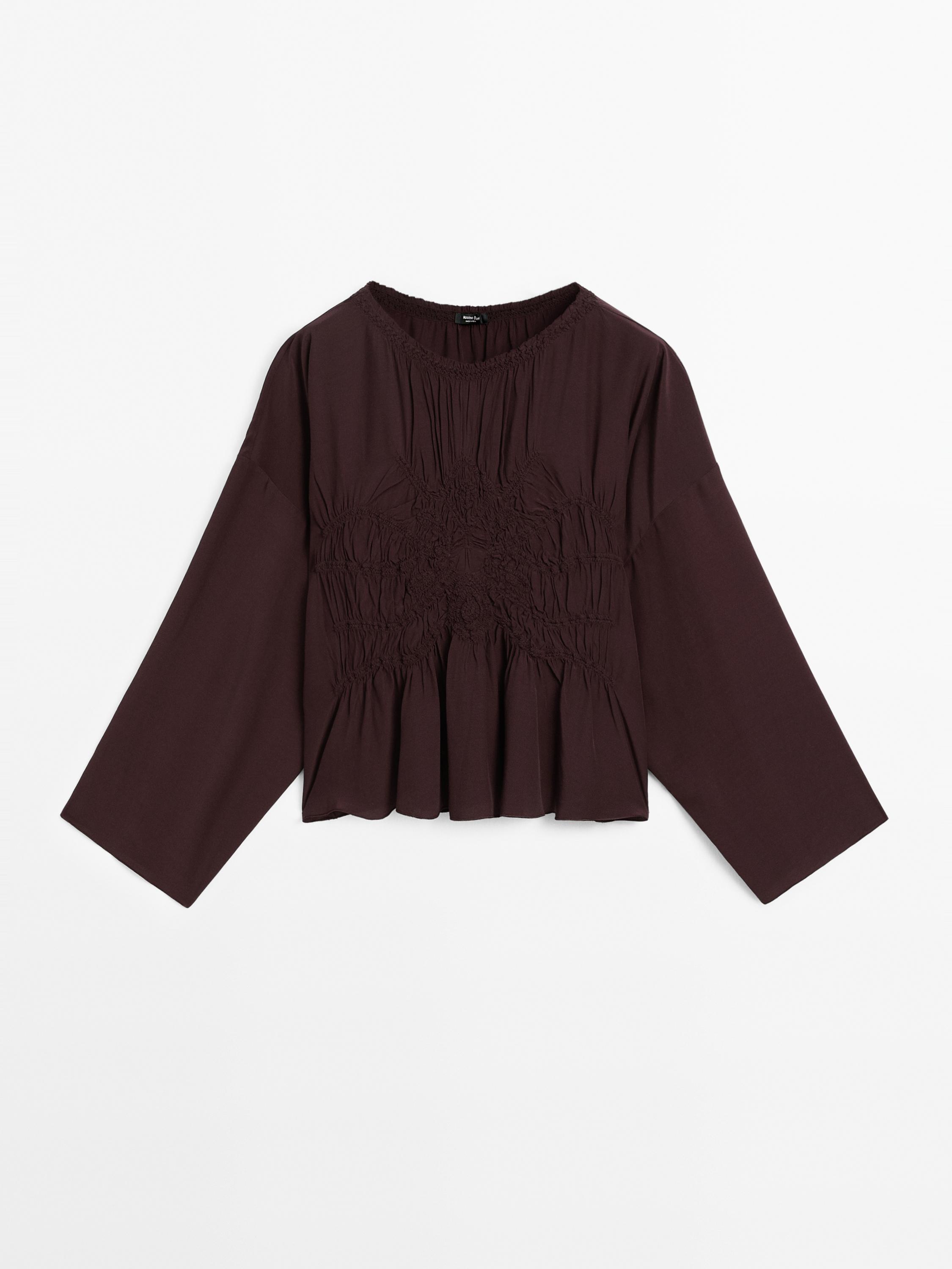Flowing blouse with gathered detail