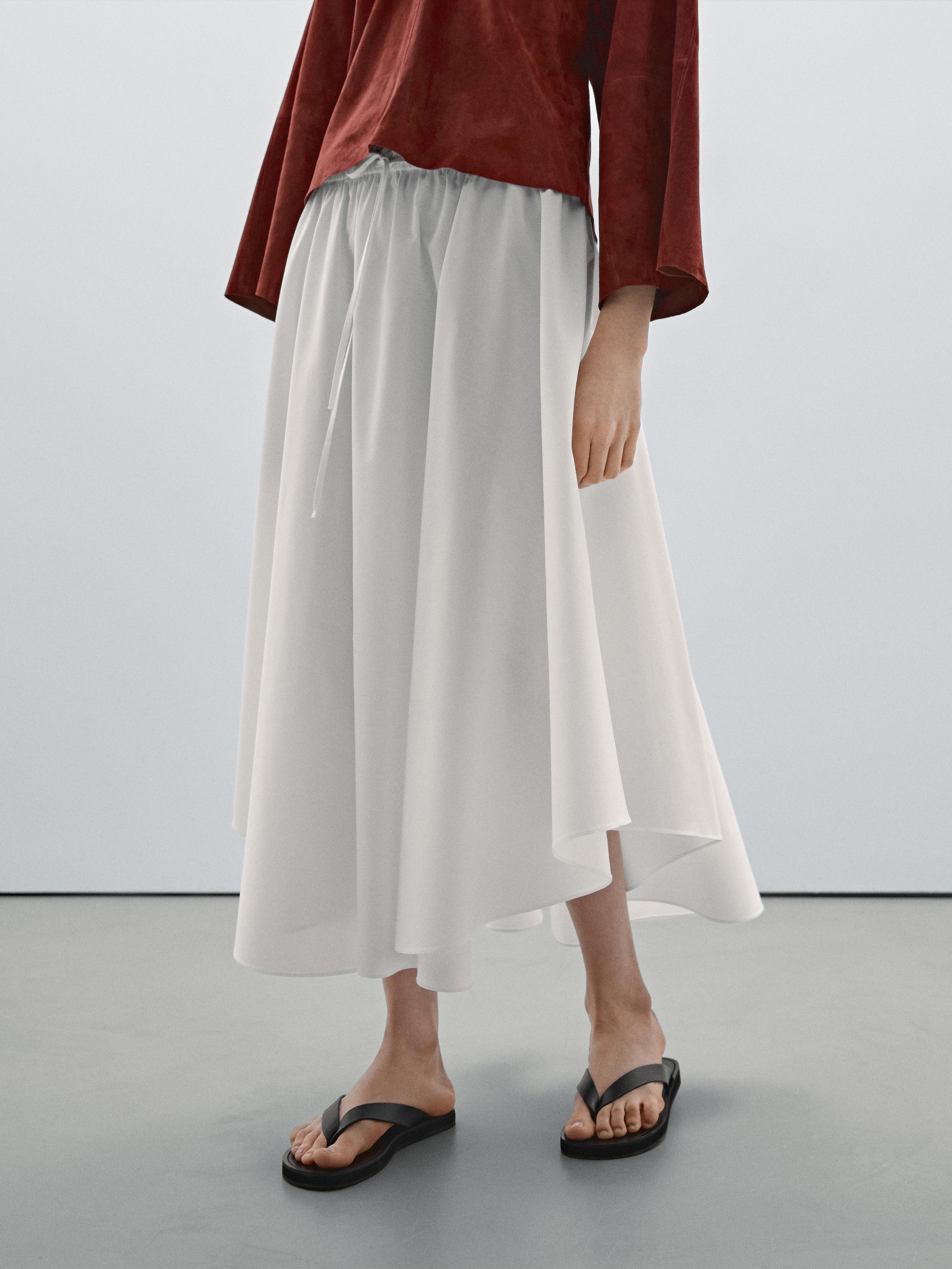 Flowing asymmetric midi skirt