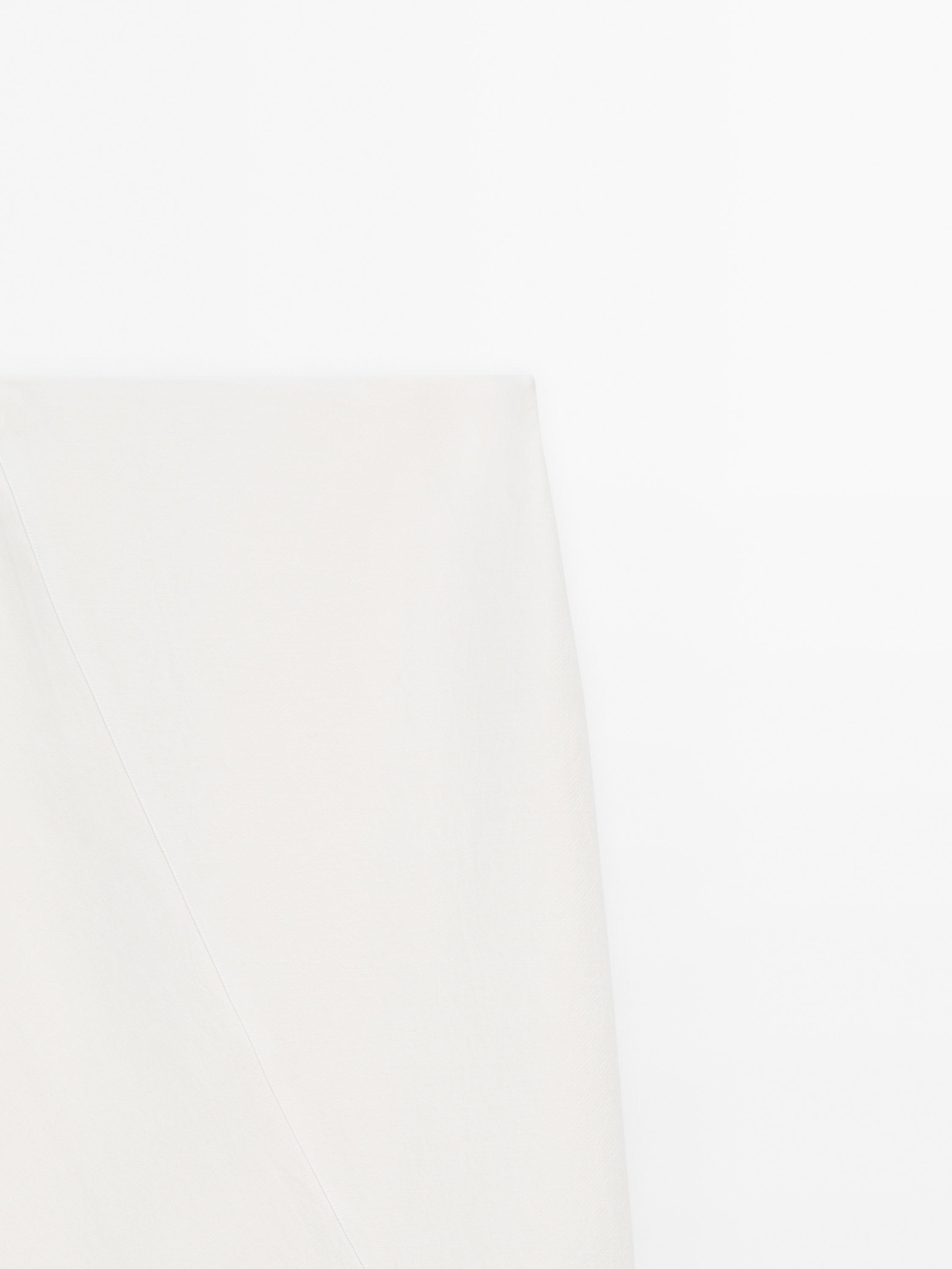 Asymmetric flounce midi skirt