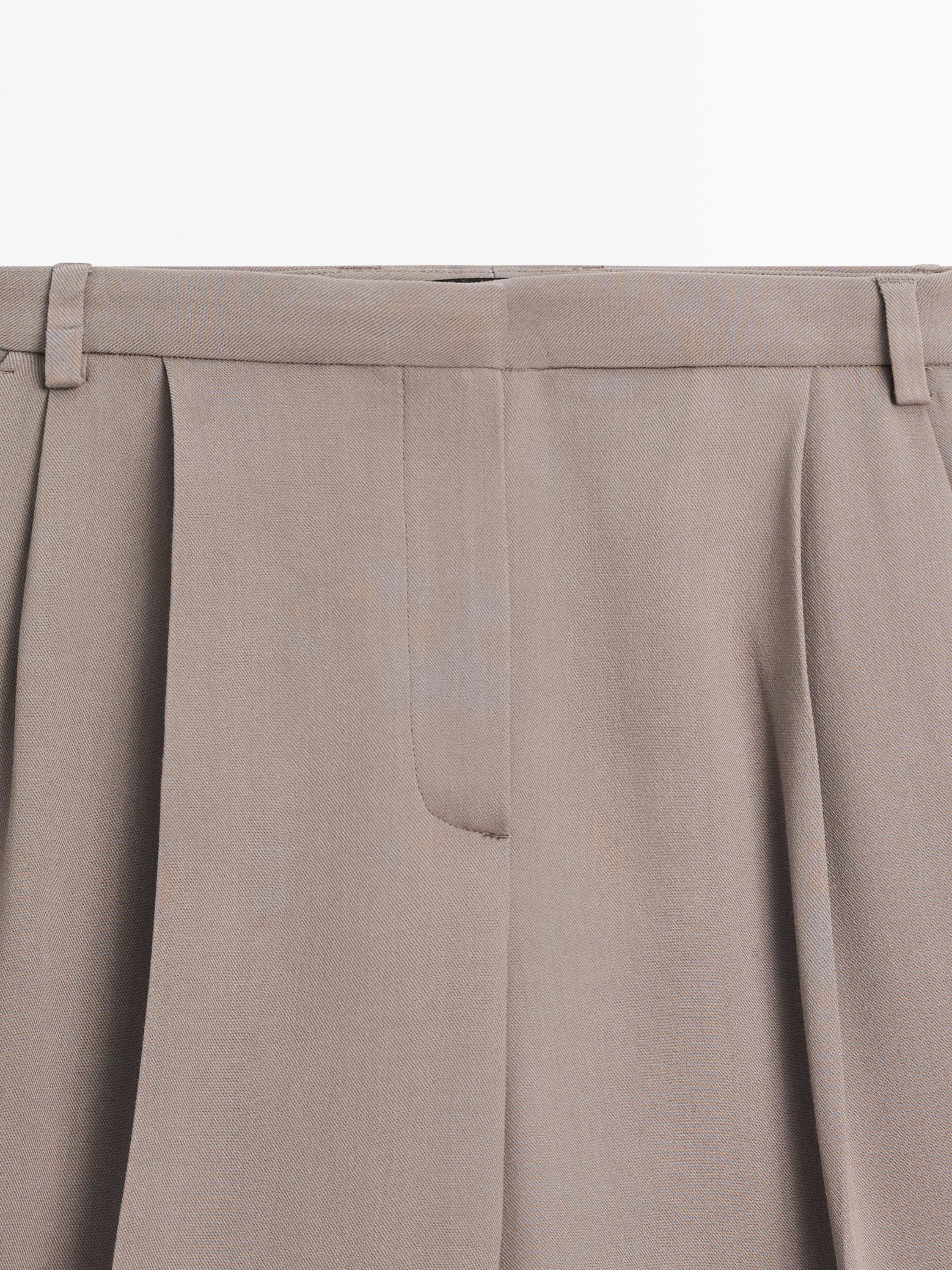 شورت برمودا طويل فضفاض بساق عريضة