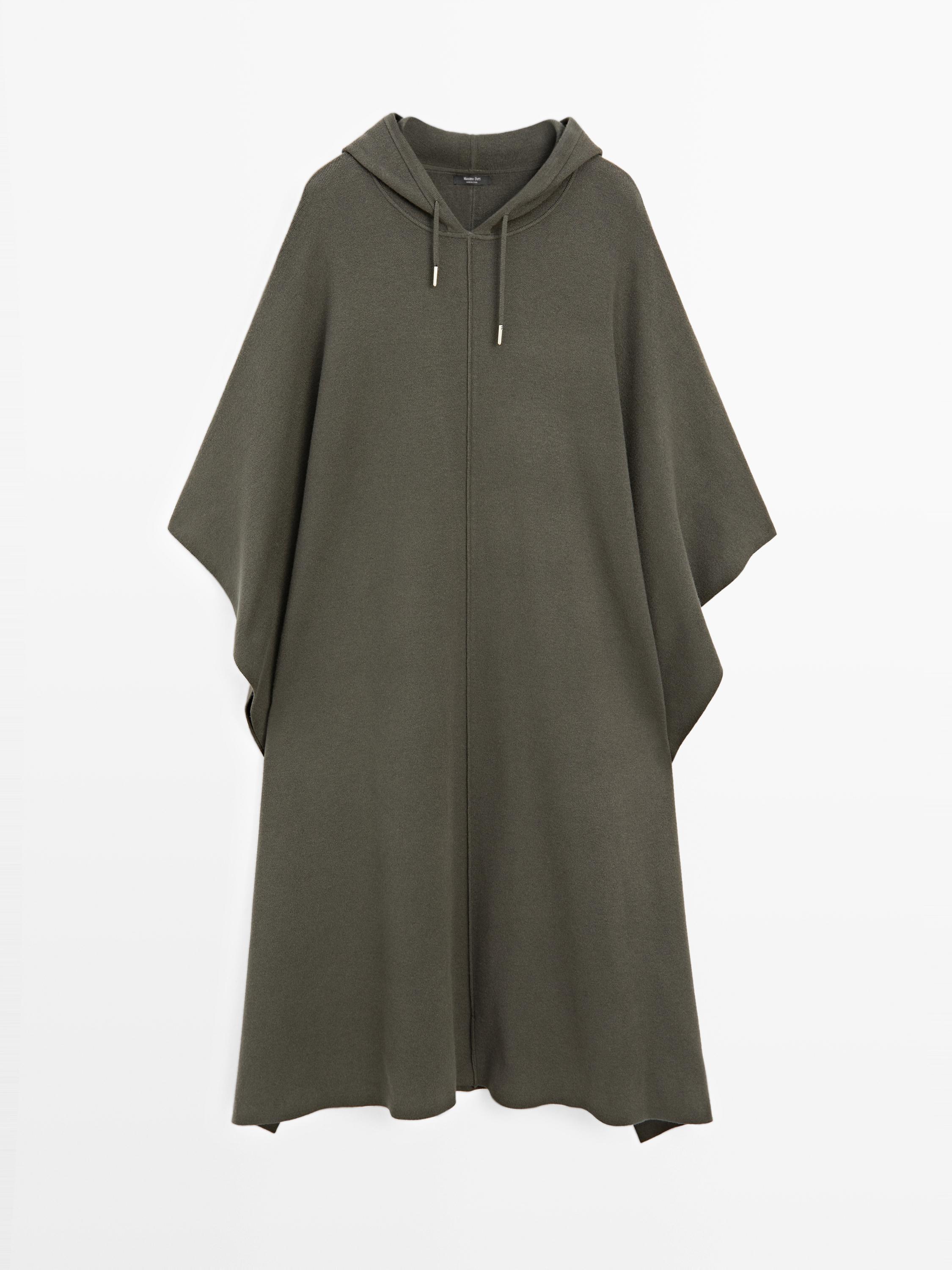 Long knit cape with adjustable hood