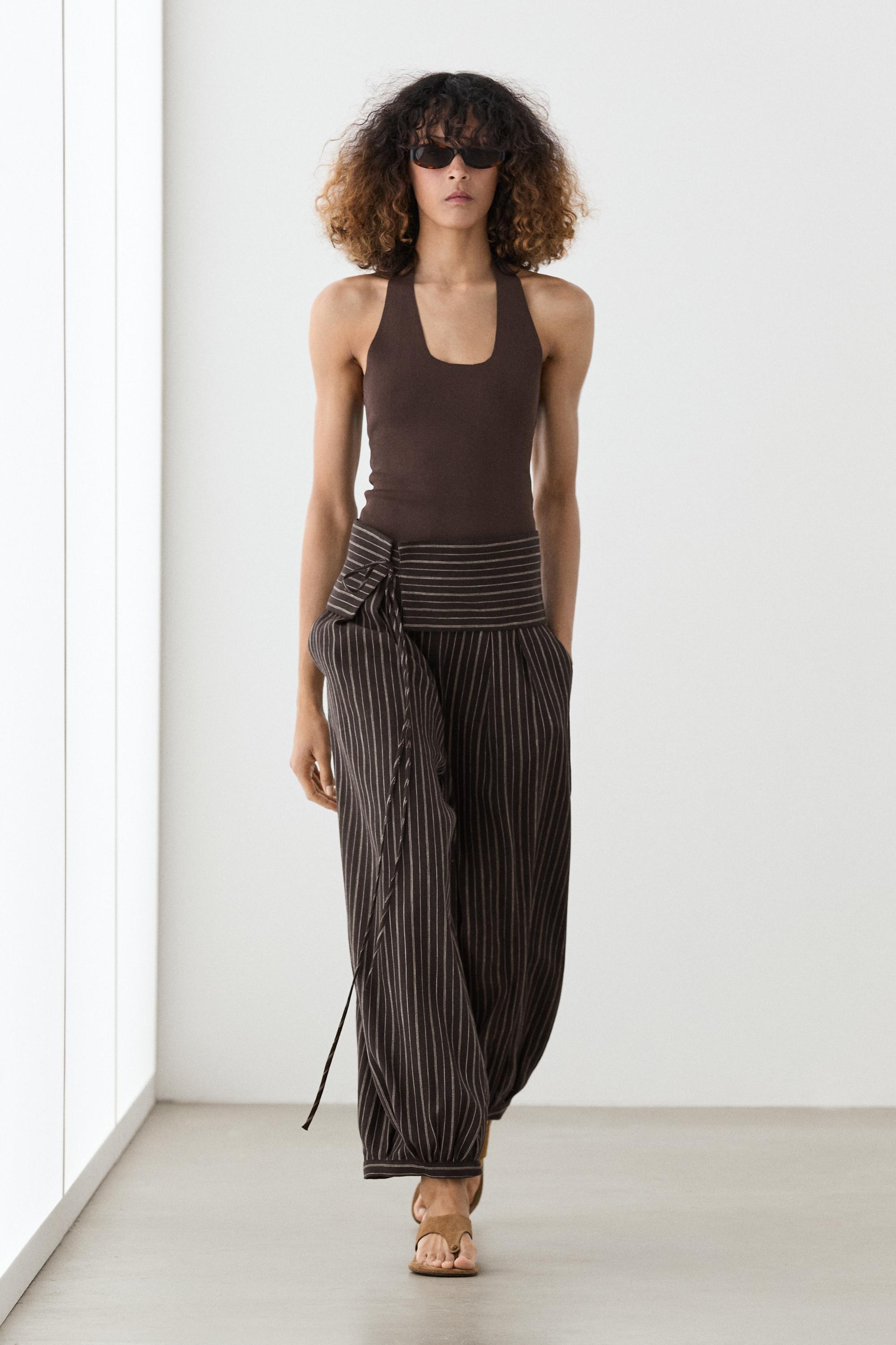 Striped sarouel trousers with cummerbund detail