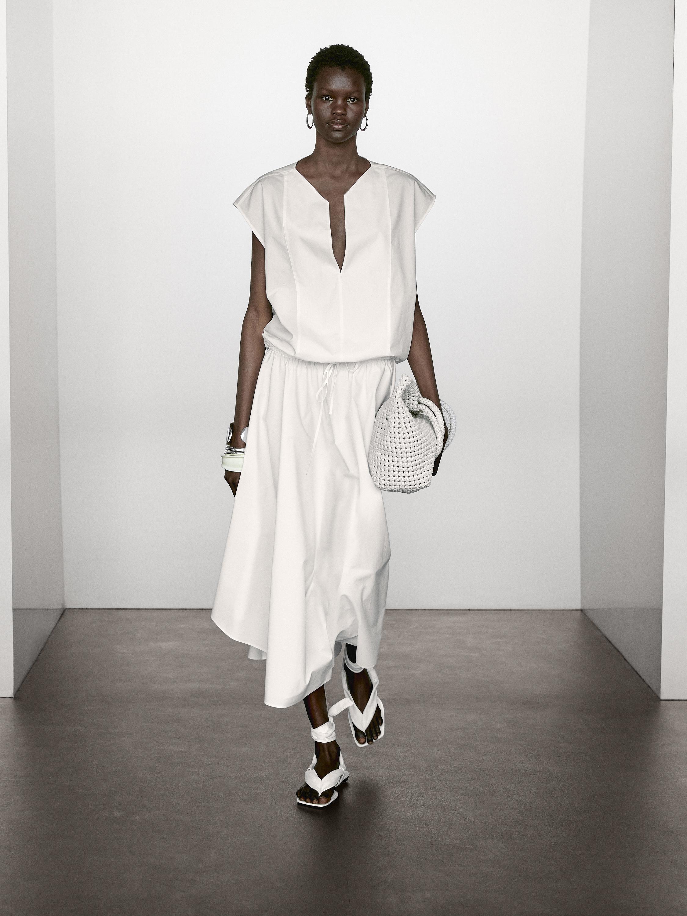 Blusa de popelina com pormenor de elástico em algodão