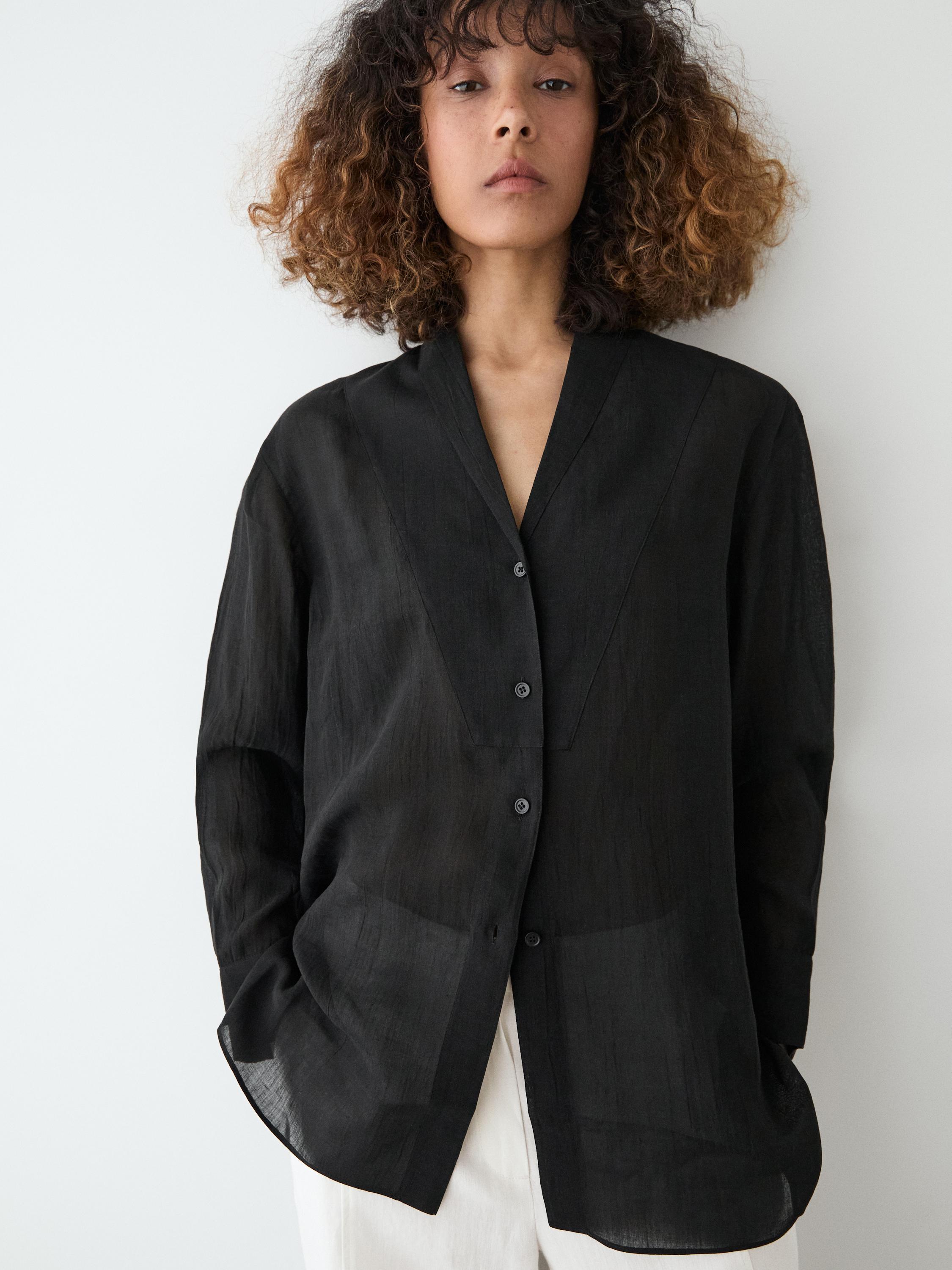 Flowing semi-sheer shirt with chest detail