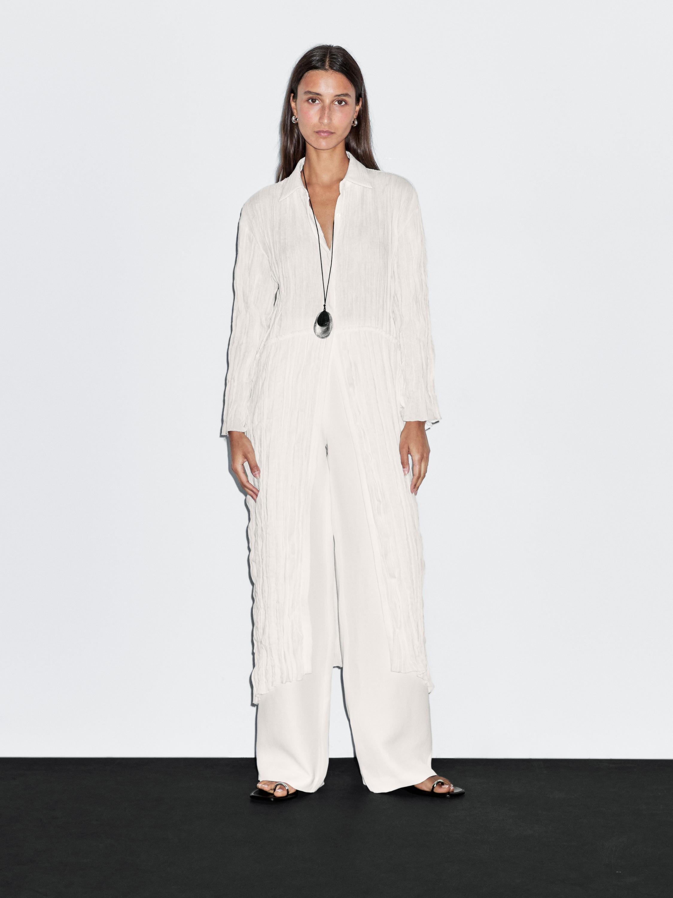 بلوزة بليسيه طويلة فضفاضة