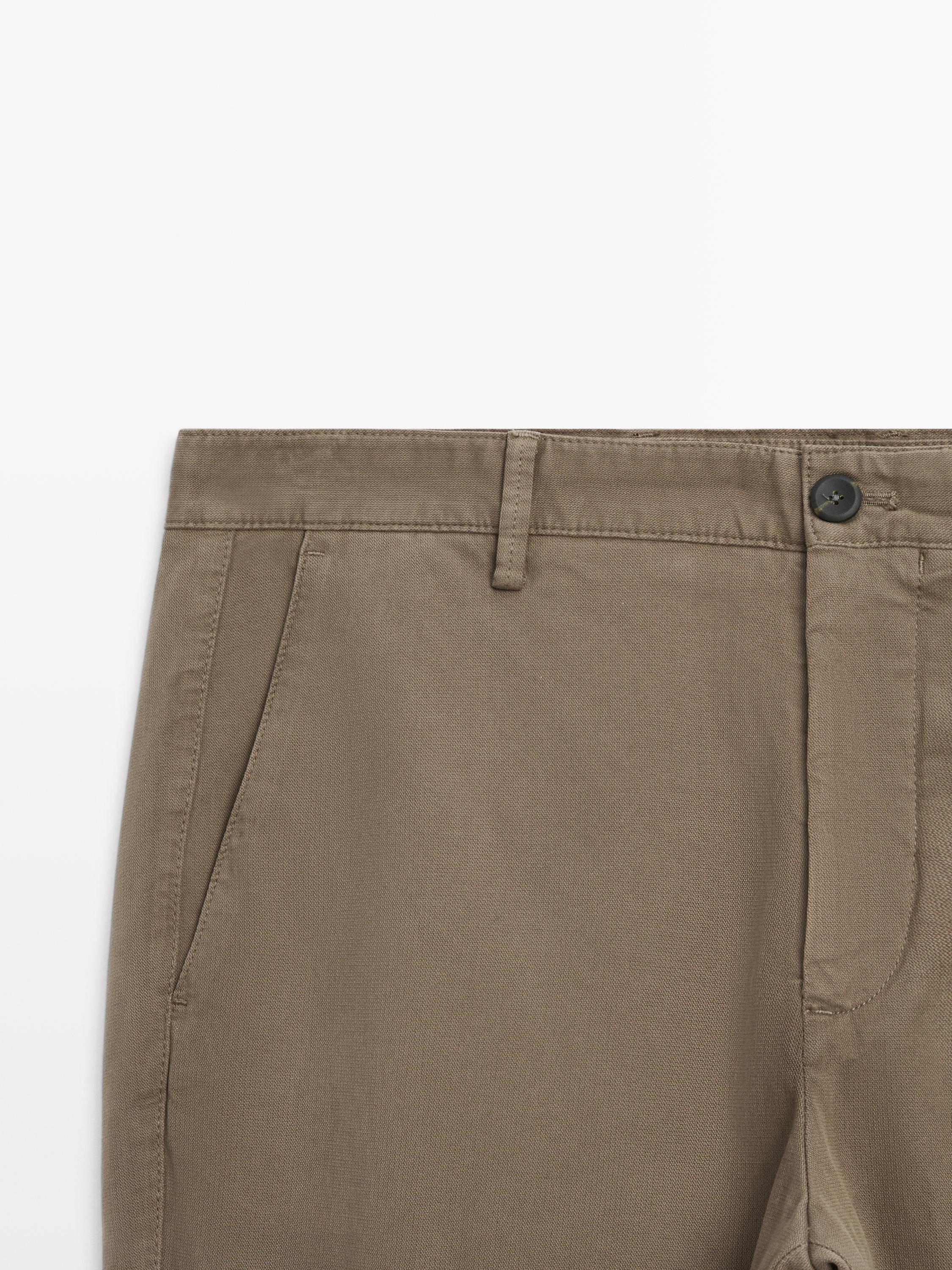 Slim-fit micro-textured trousers — GREEN