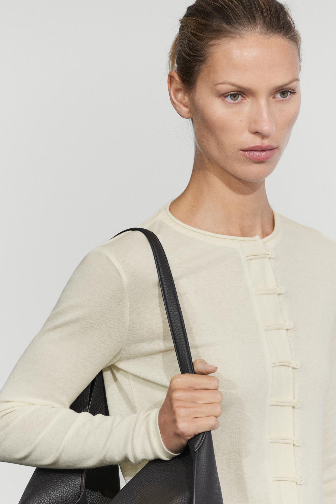 Cotton blend T-shirt with button detail — CREAM