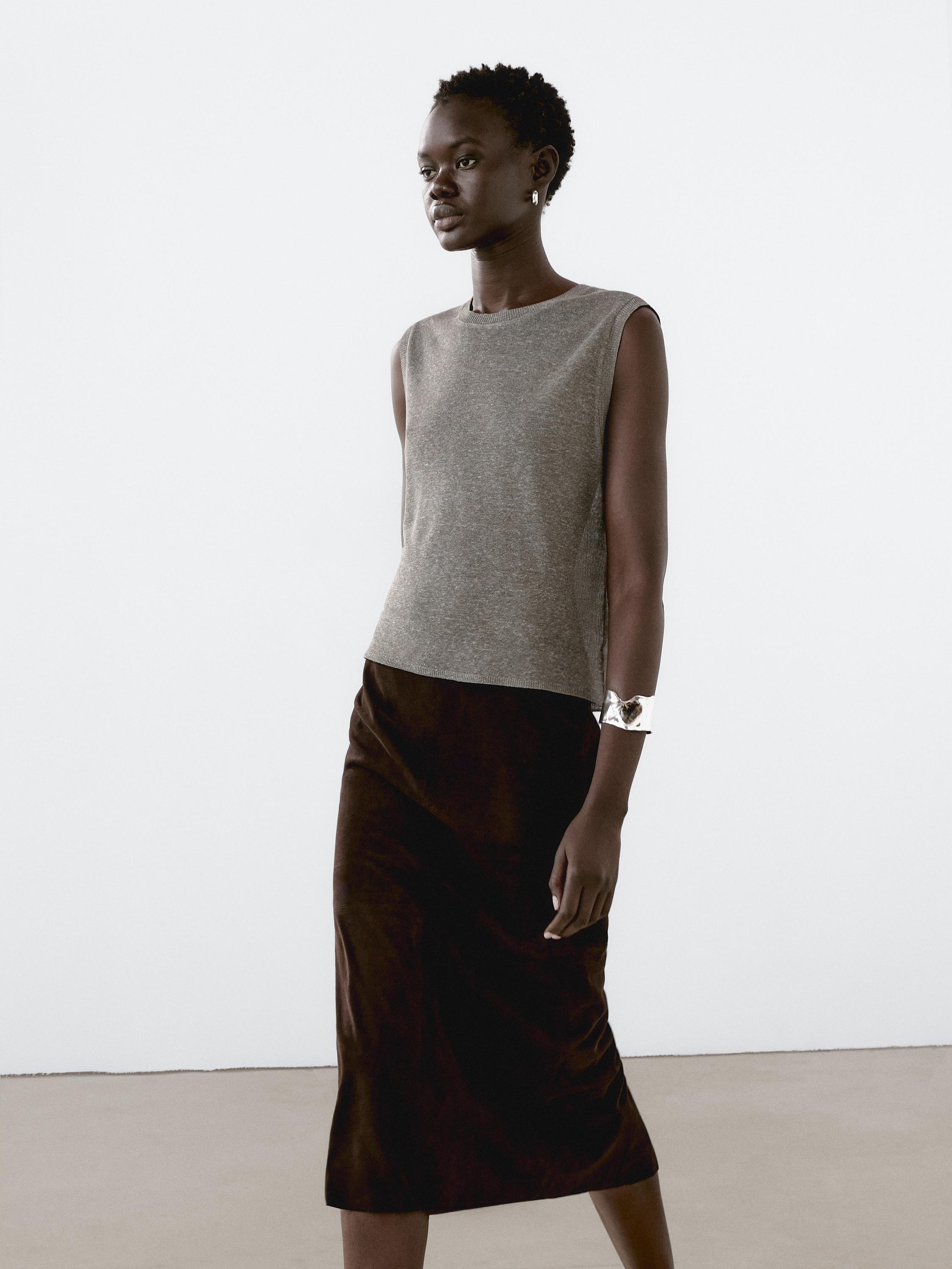 Sleeveless top in flowing fabric