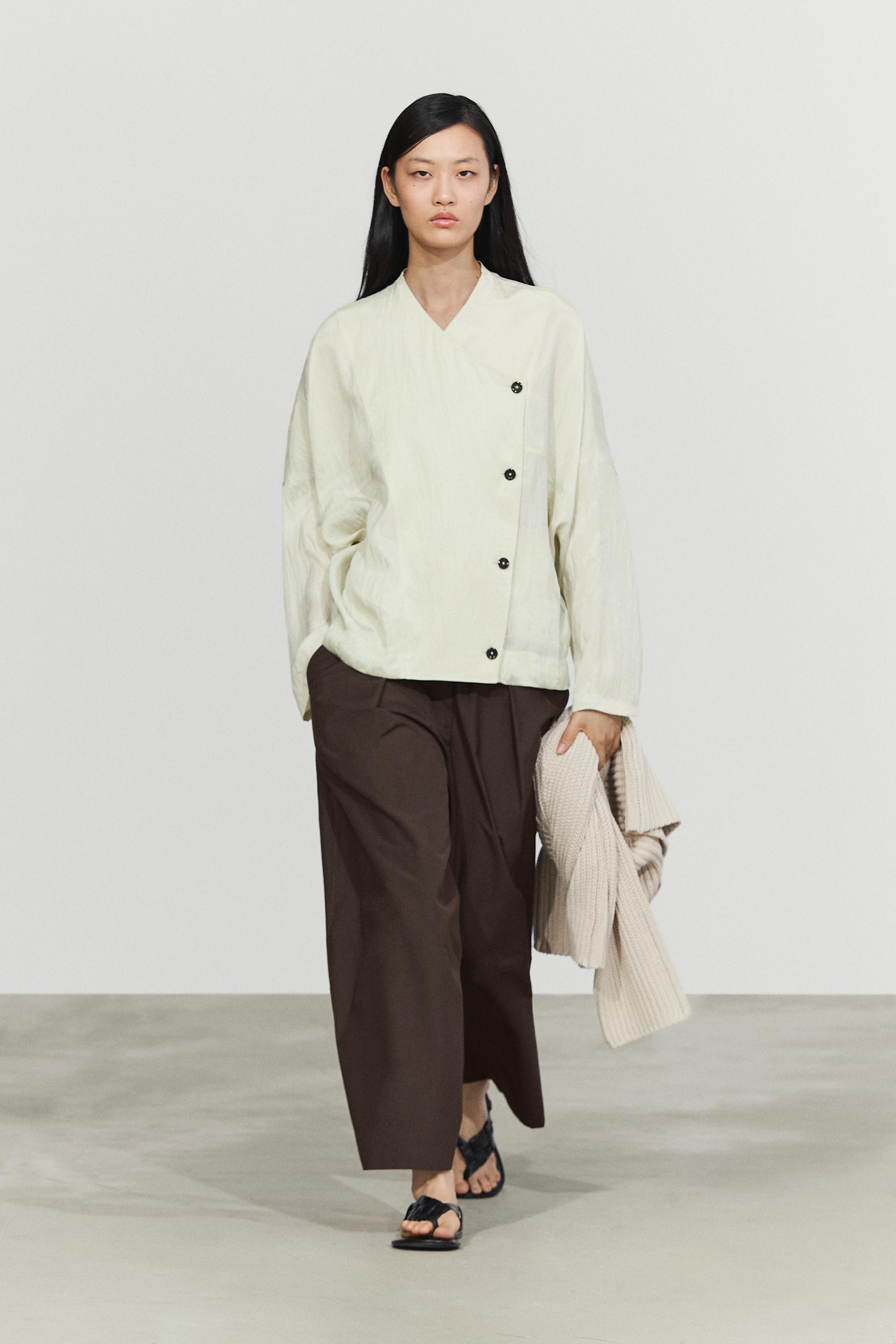 Fluid wrap shirt with button detail