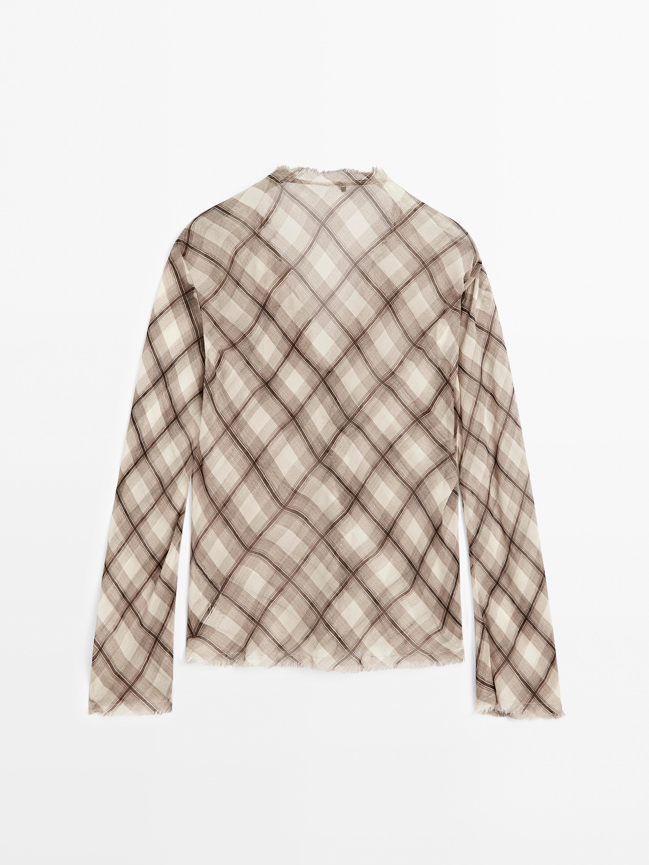 Check shirt with frayed trims