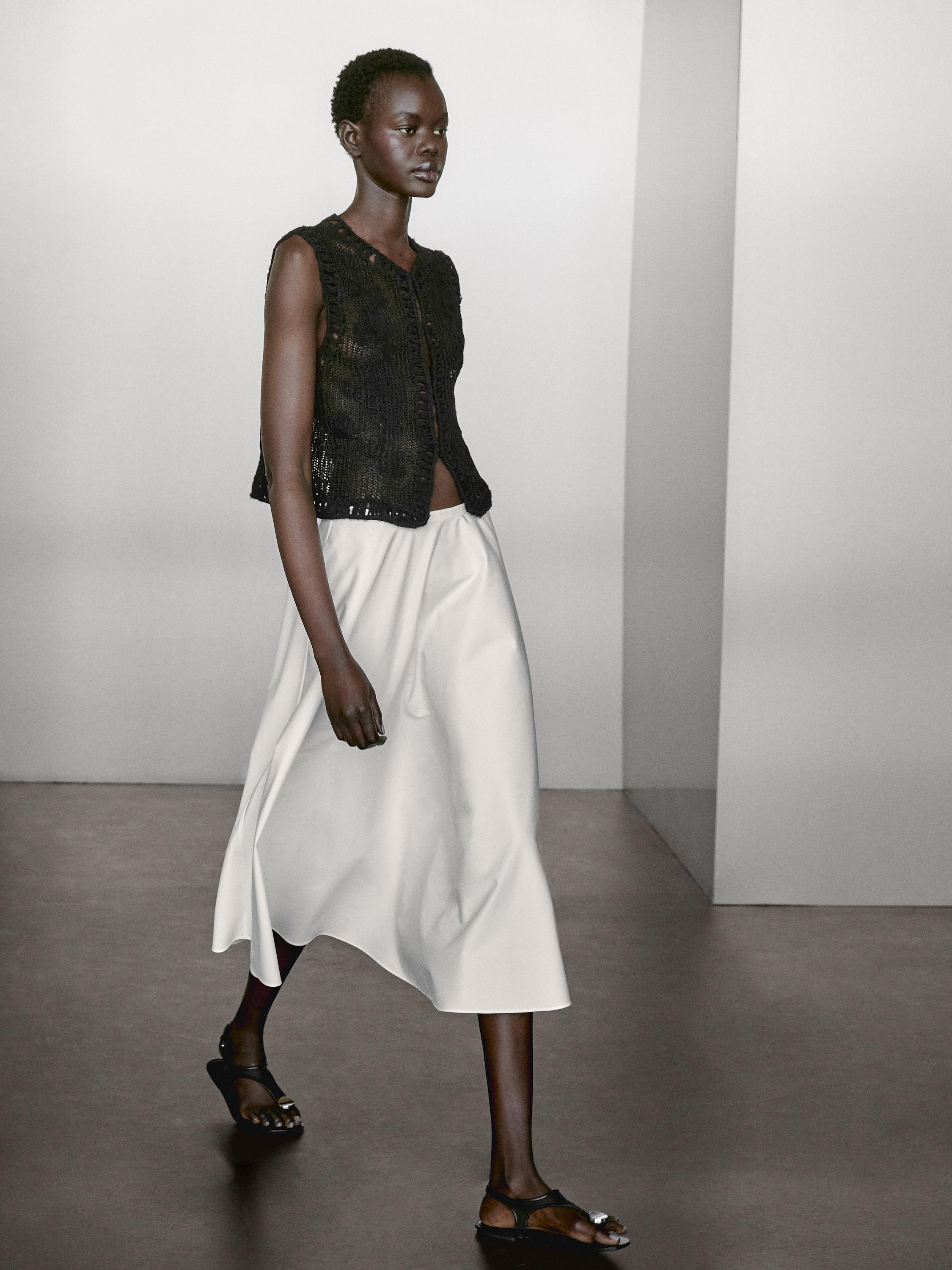 Knit vest with embroidered detail