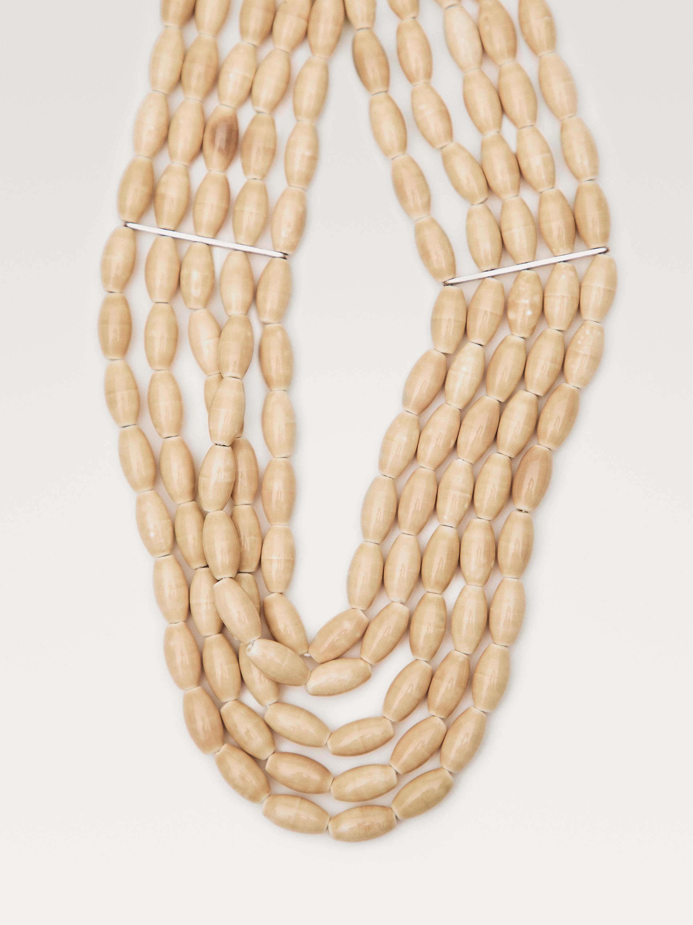 Collar babero cerámica
