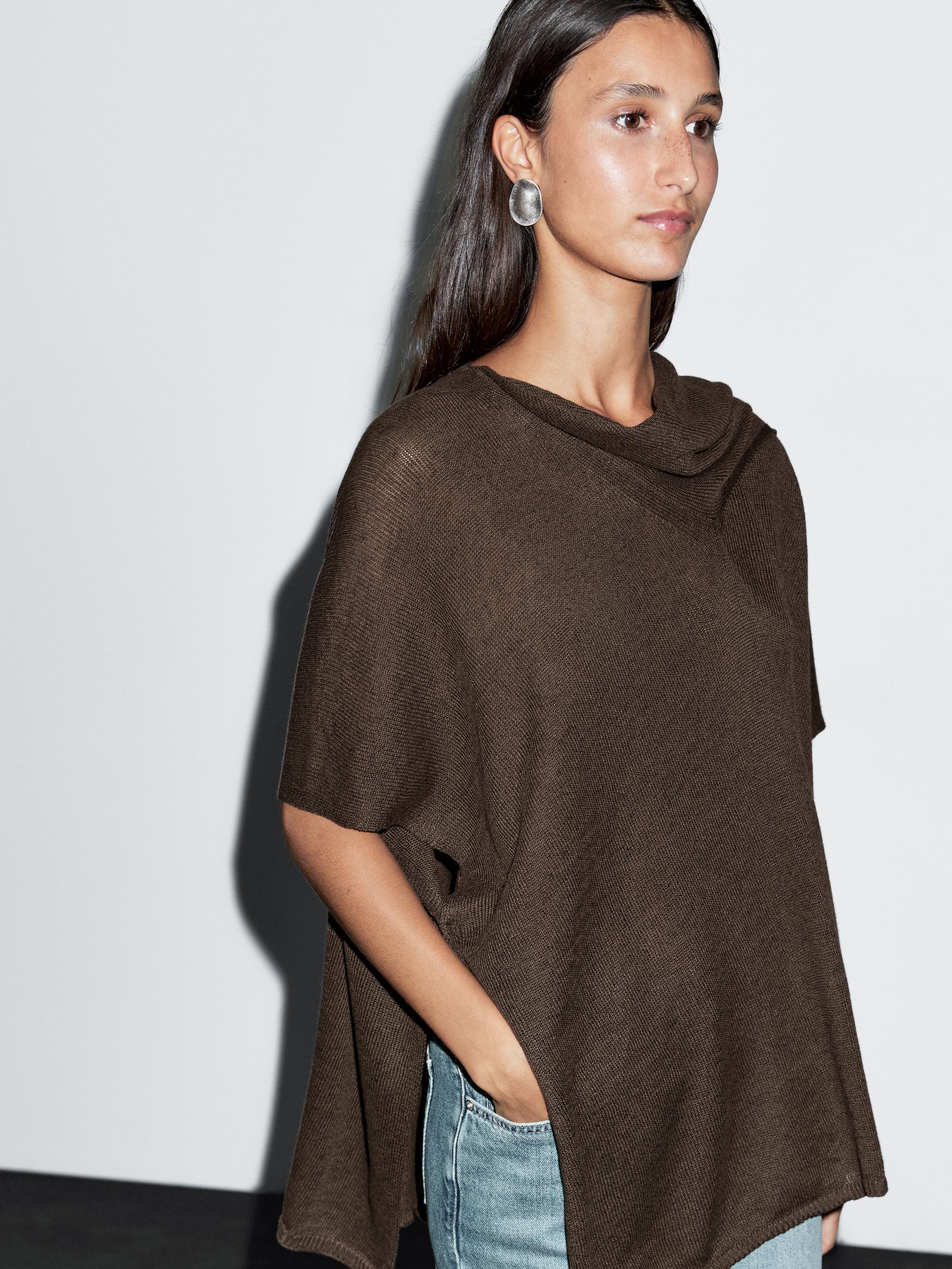 Knit cape with scarf