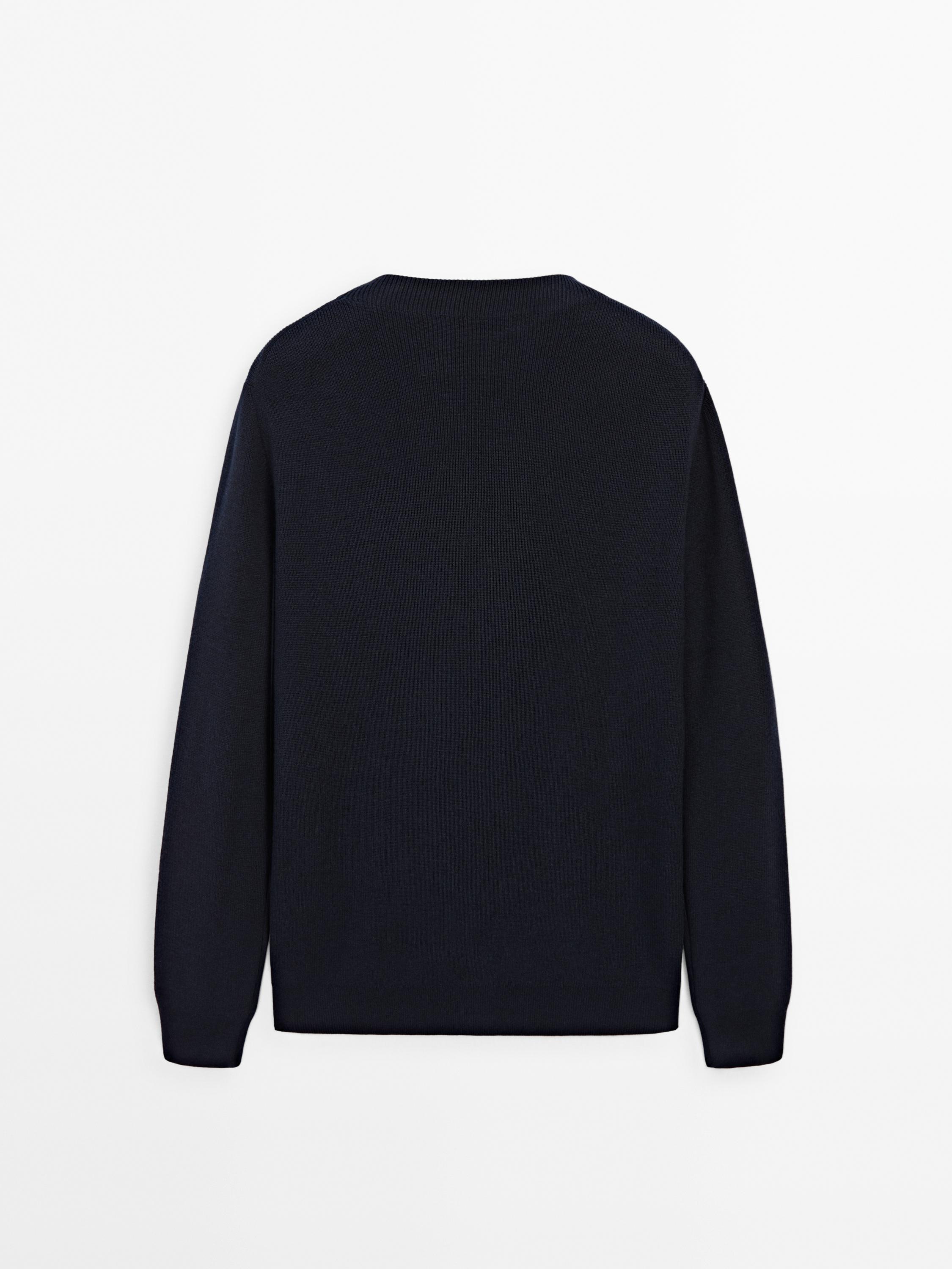 Pull en maille à col montant