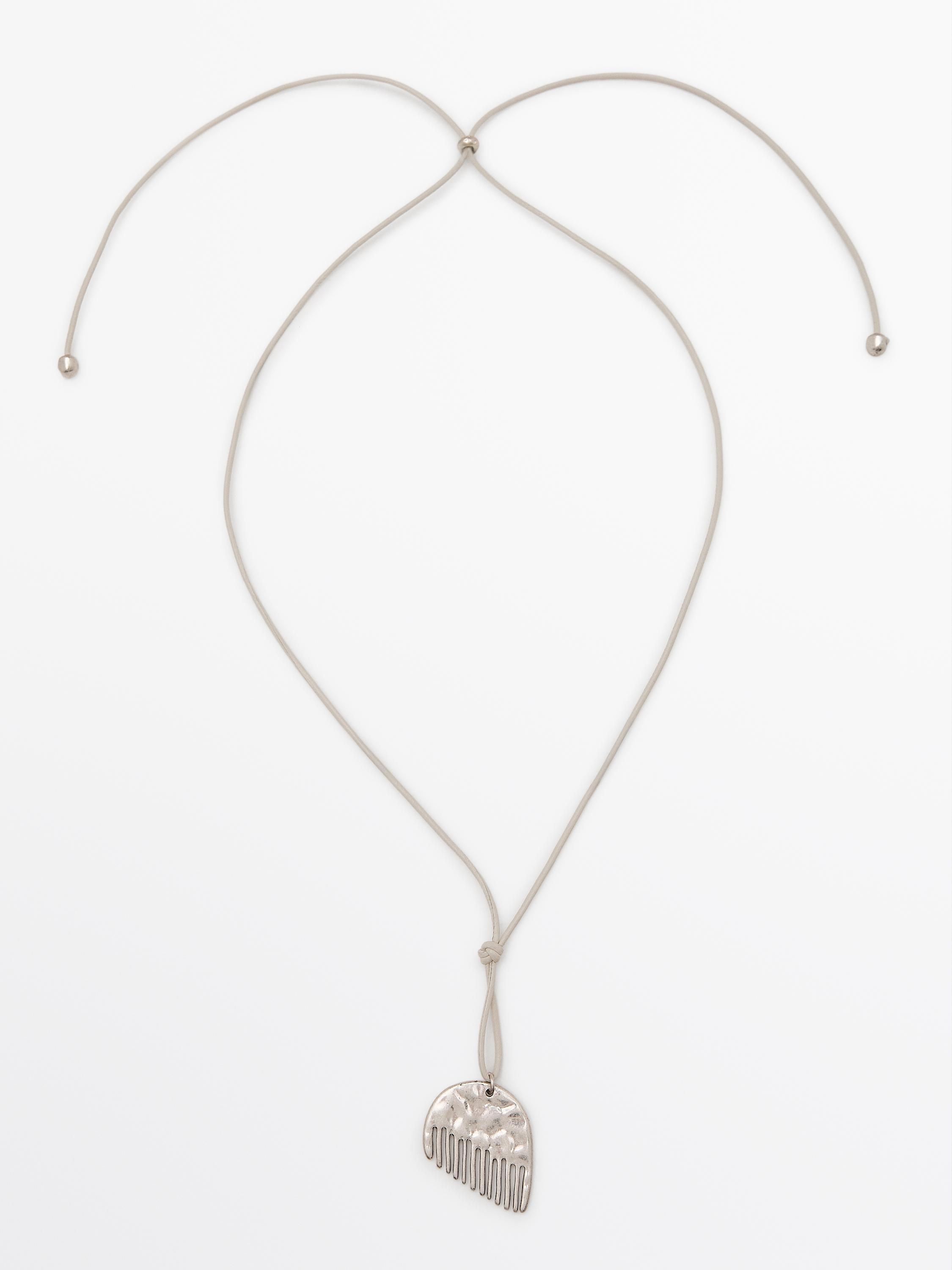 Cord necklace with comb piece