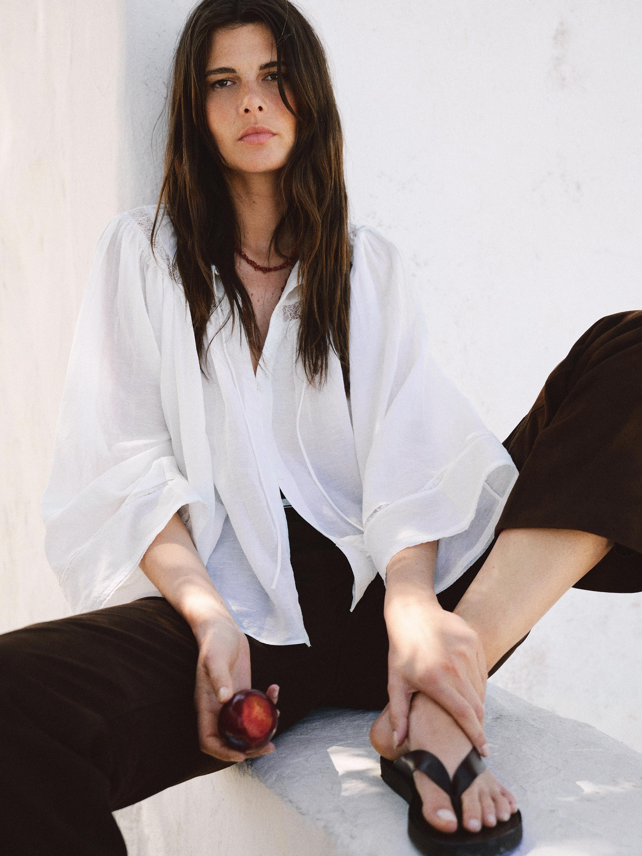 Flowing blouse with lace detail