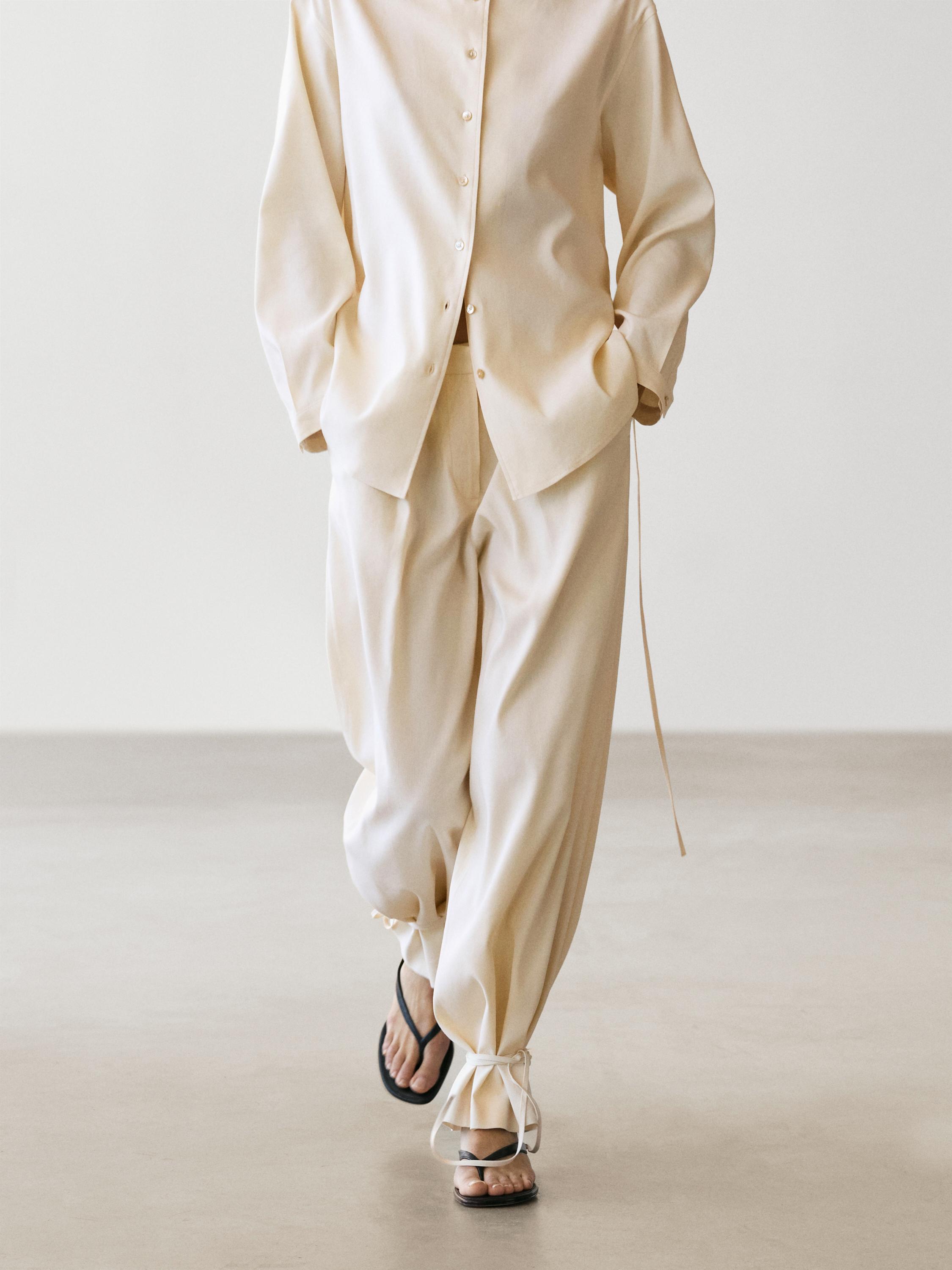 Flowing barrel fit trousers — CREAM