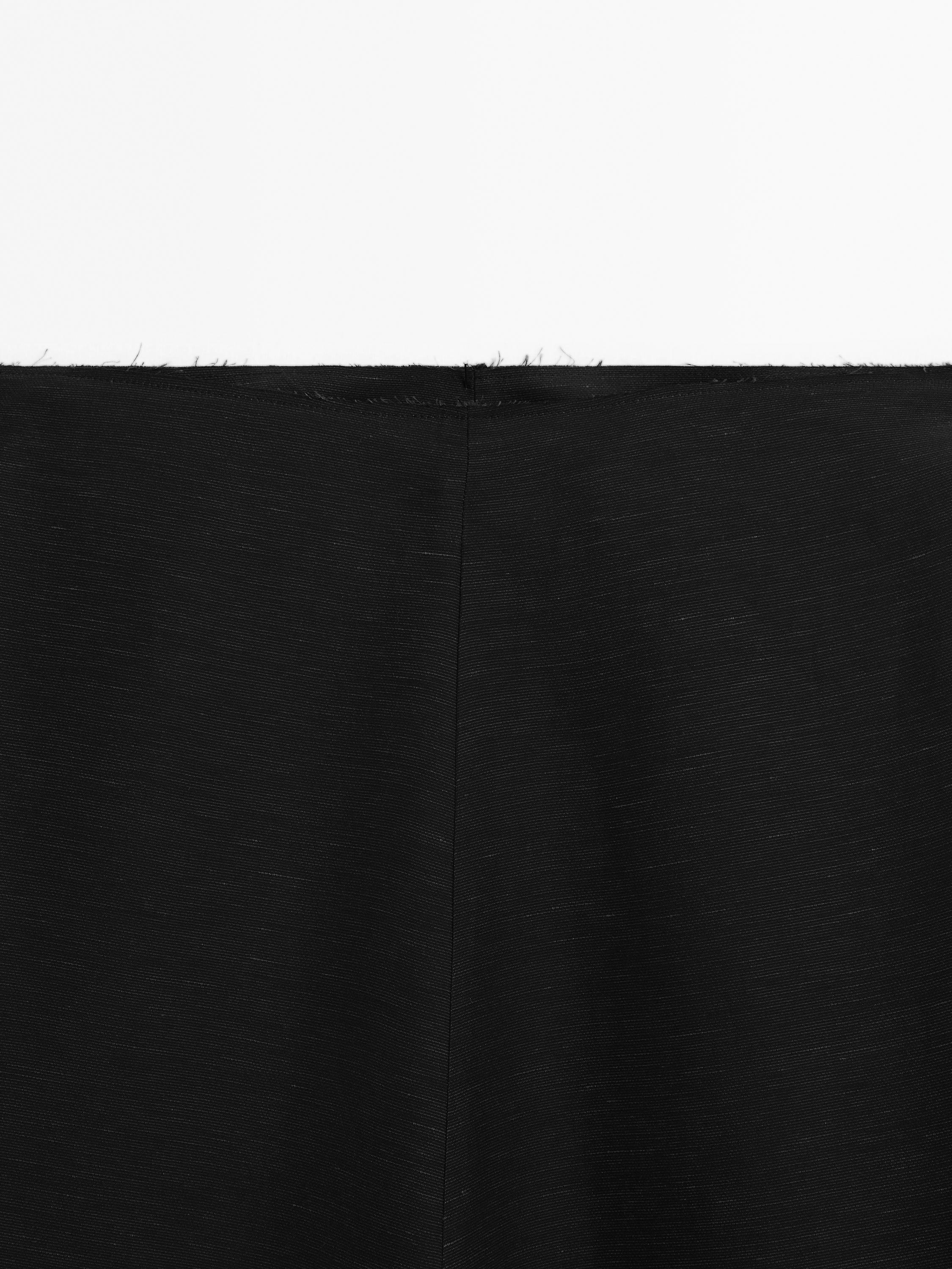 Midi skirt with topstitching detail on the hem