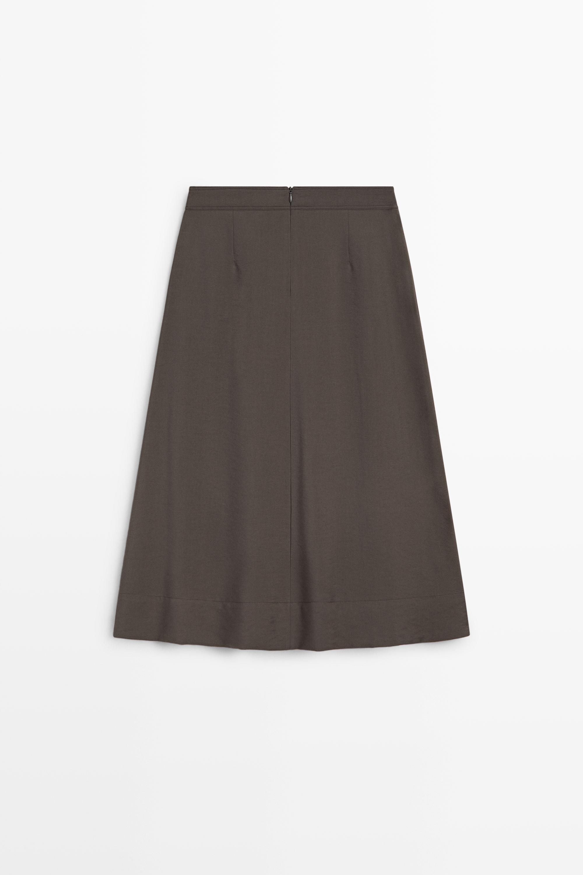 Falda midi fluida detalle pliegue