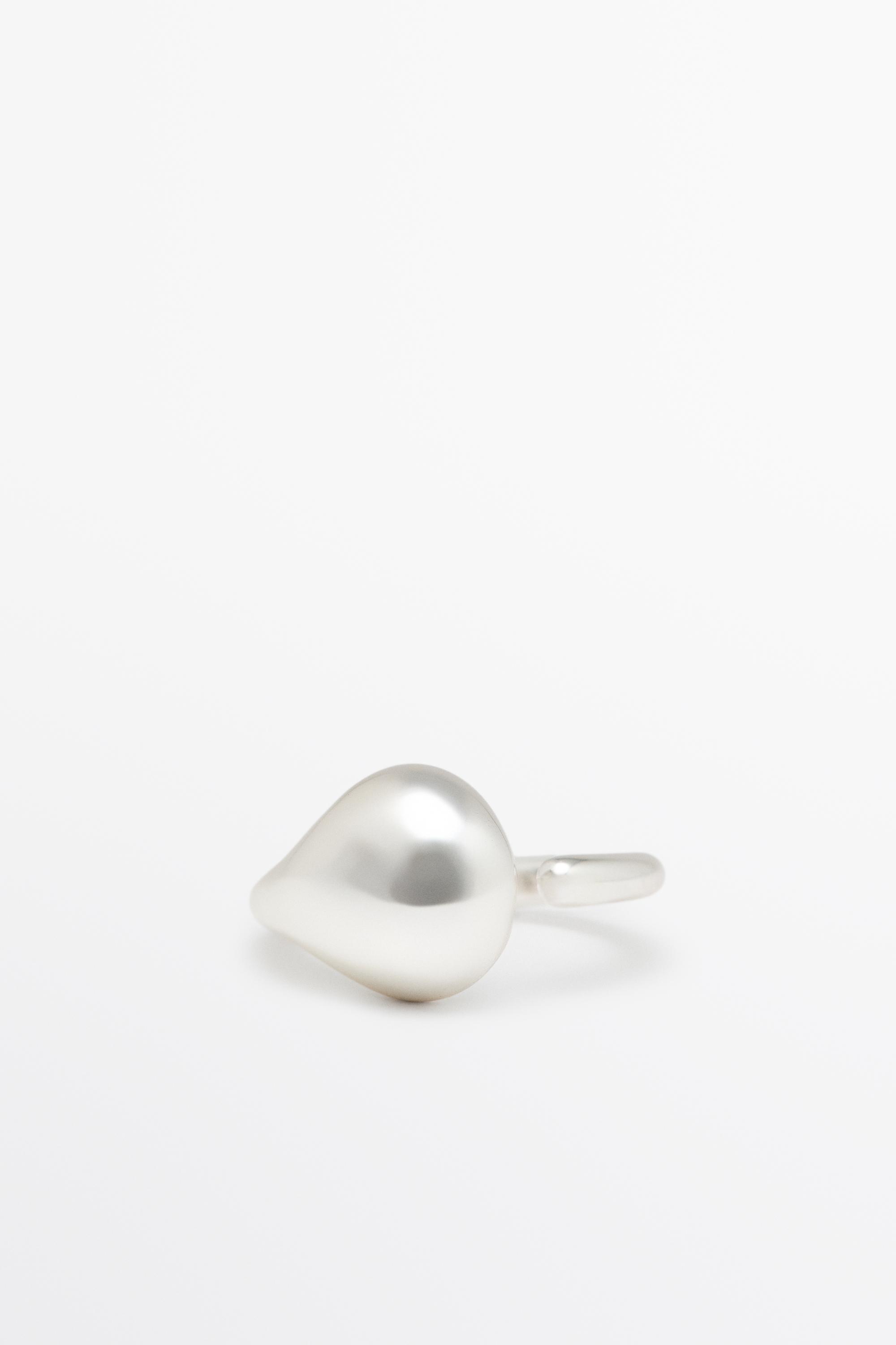 Anillo gota fluida