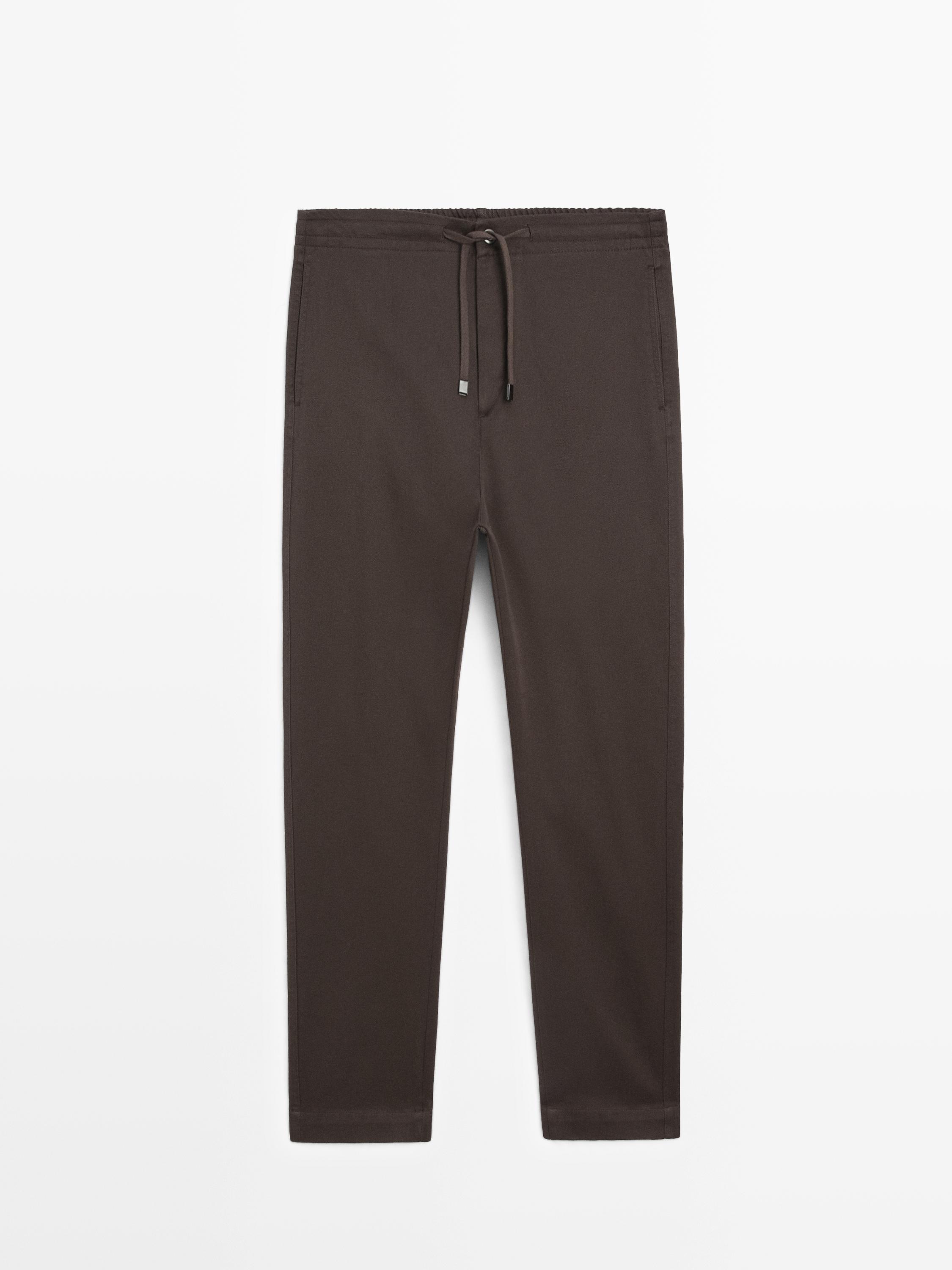 Calças jogger fit em mistura de algodão