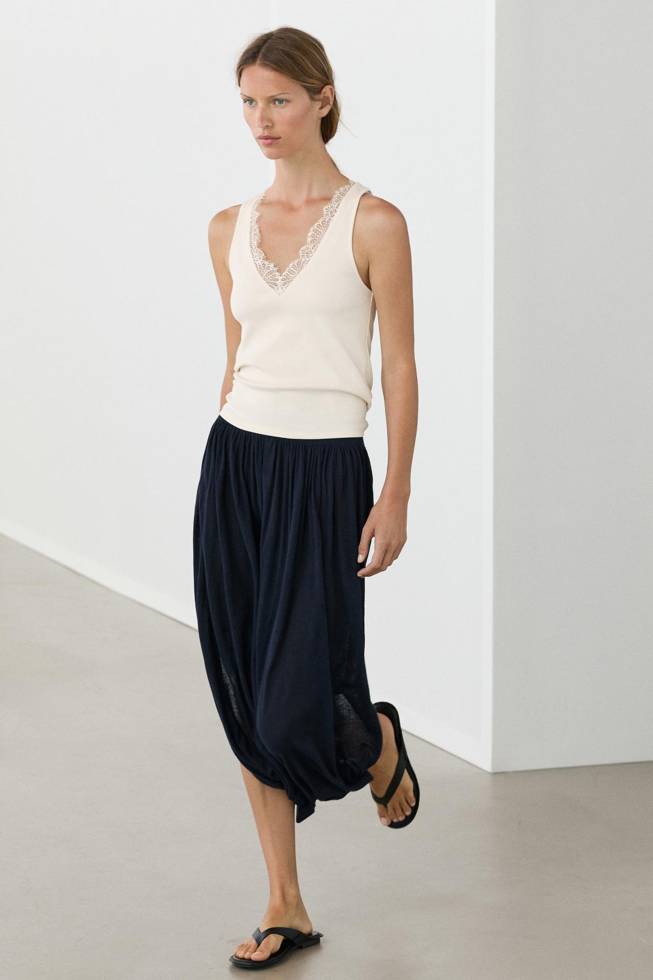 V-neck top with lace detail — CREAM