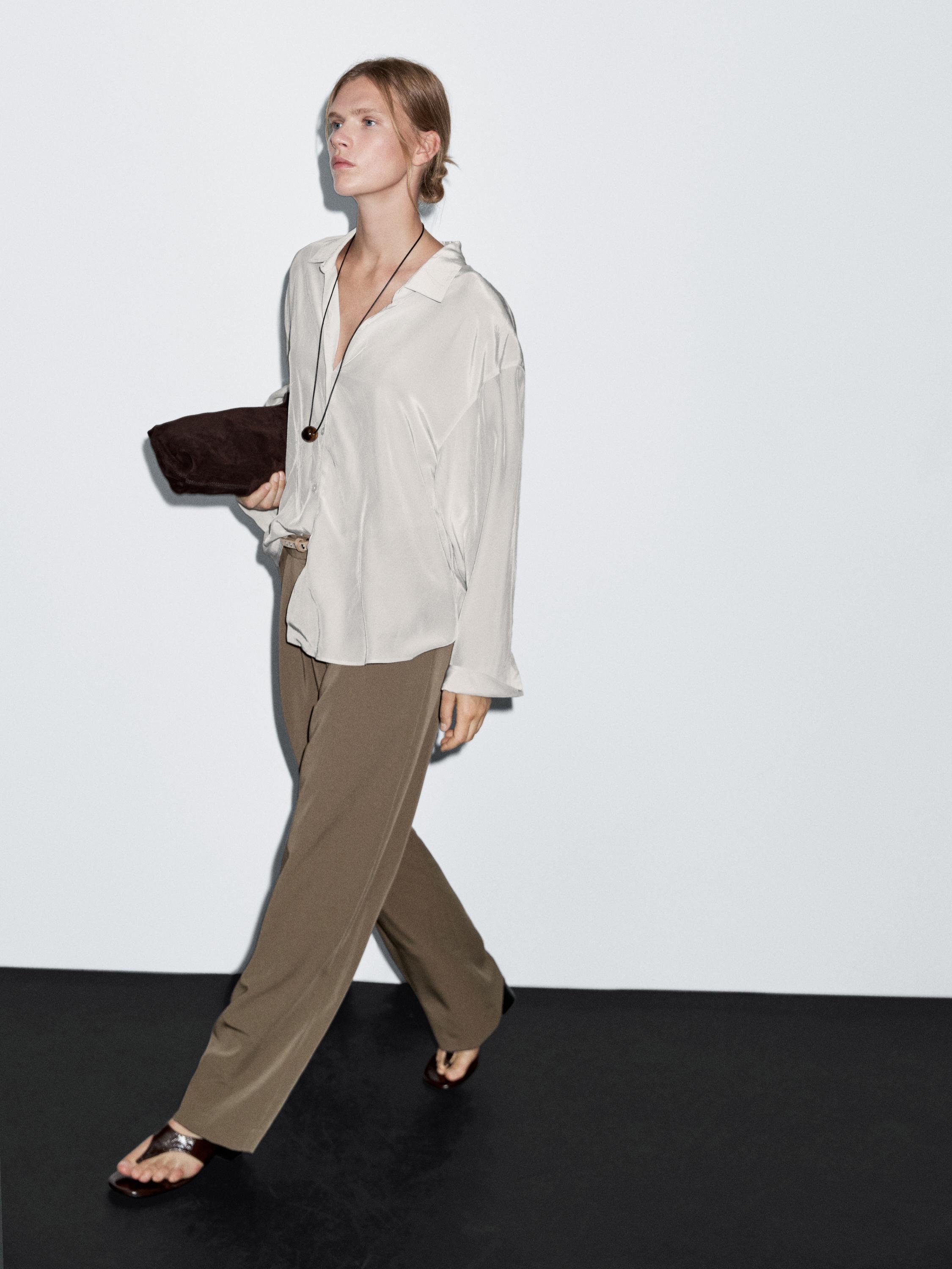 Wide-leg flowing trousers with darts