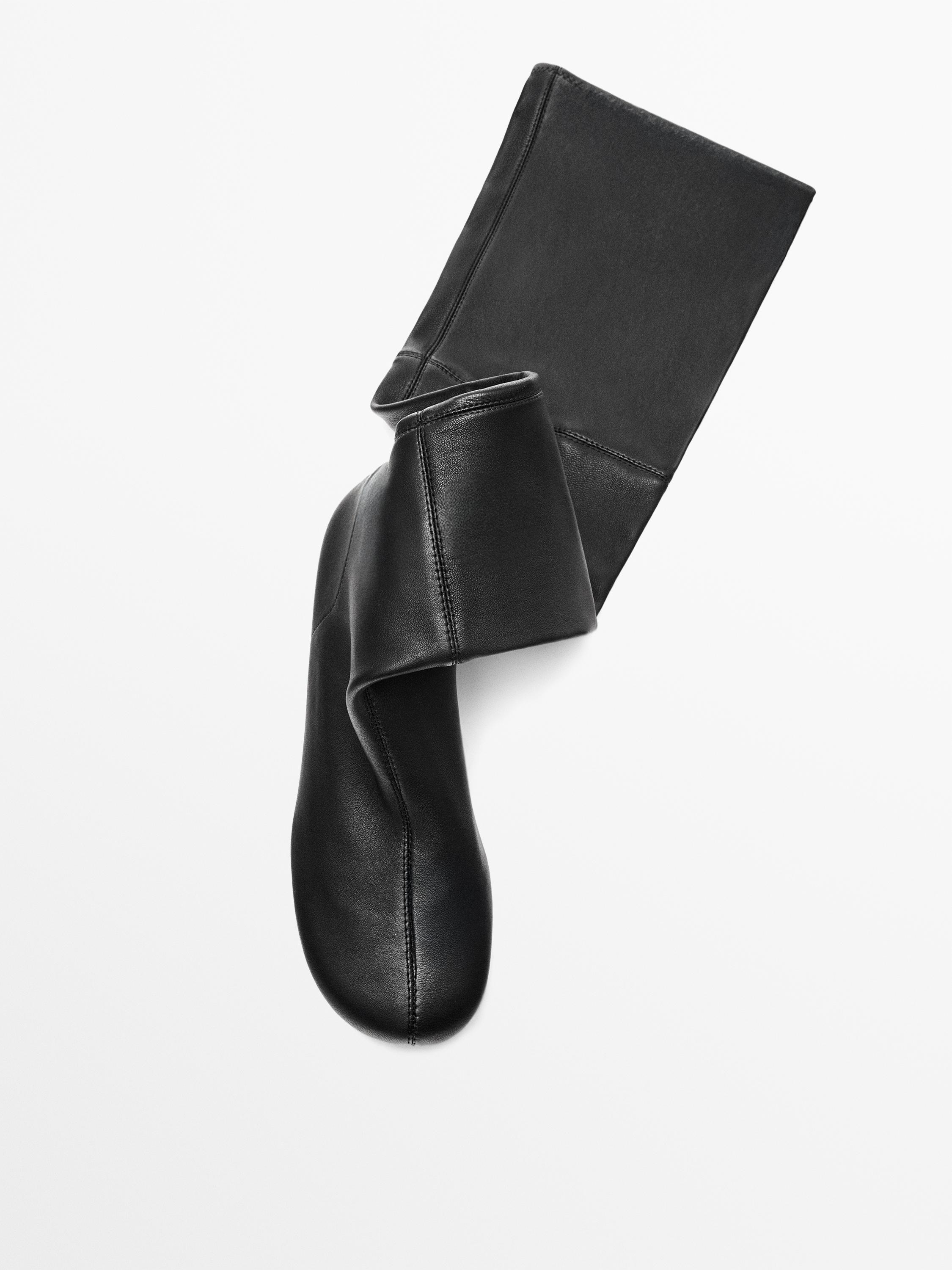 Sepatu bot elastis hak tinggi