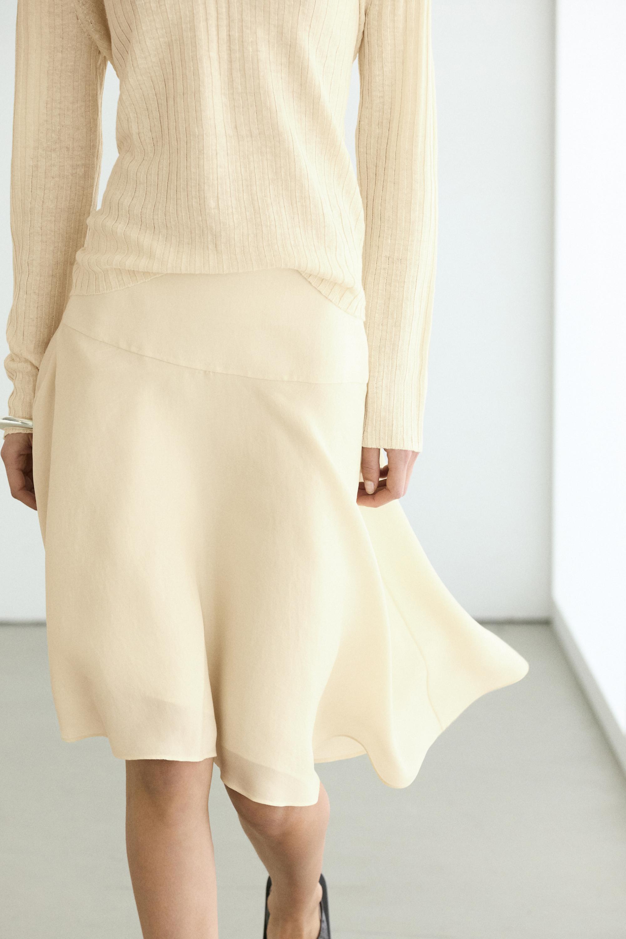Flowing asymmetric midi skirt — Gold