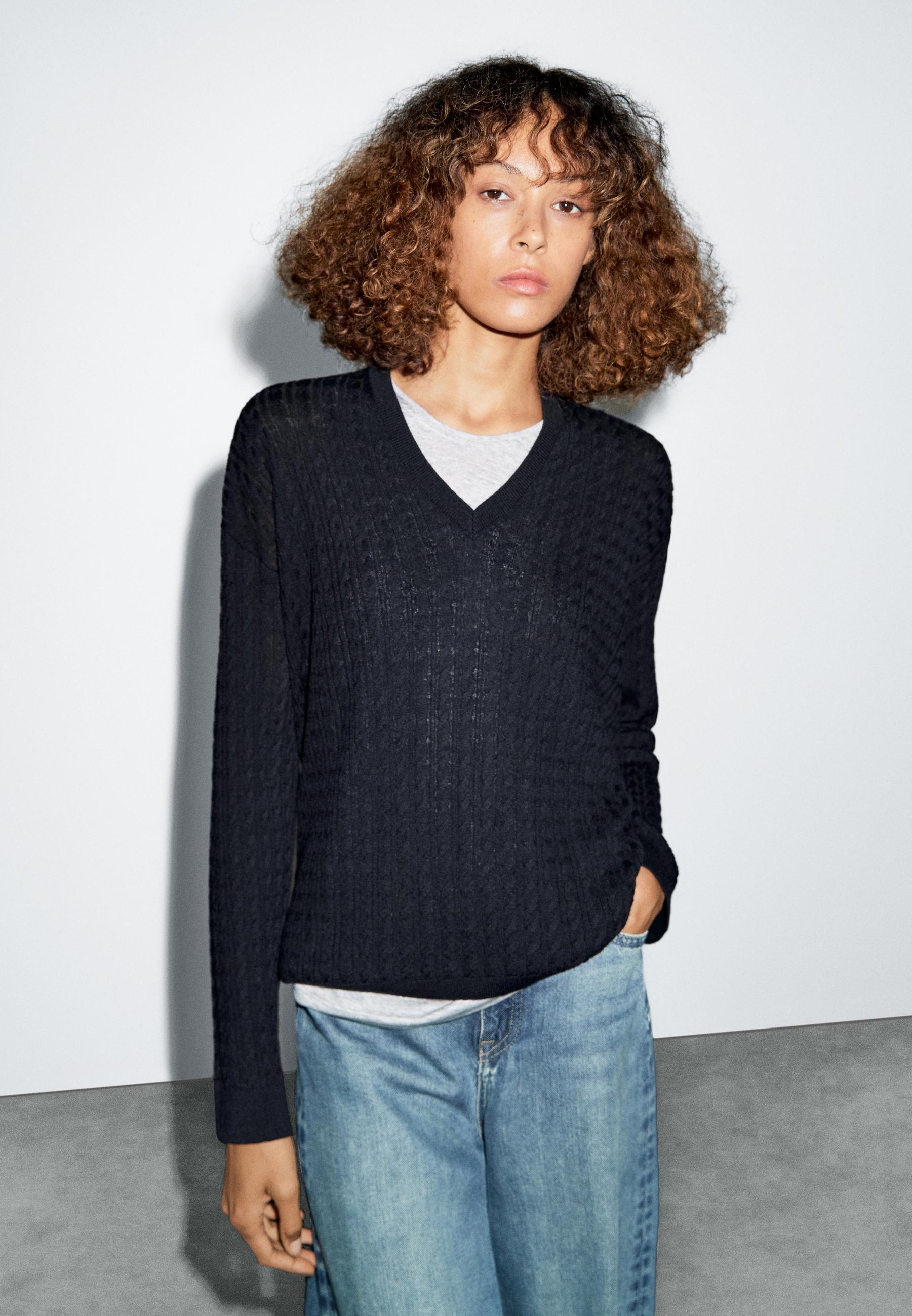 V-neck cable-knit sweater