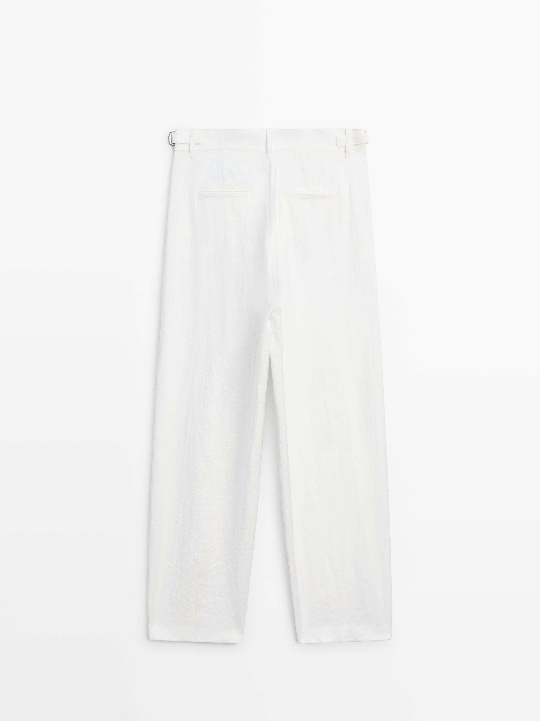Flowing trousers with buckles — WHITE