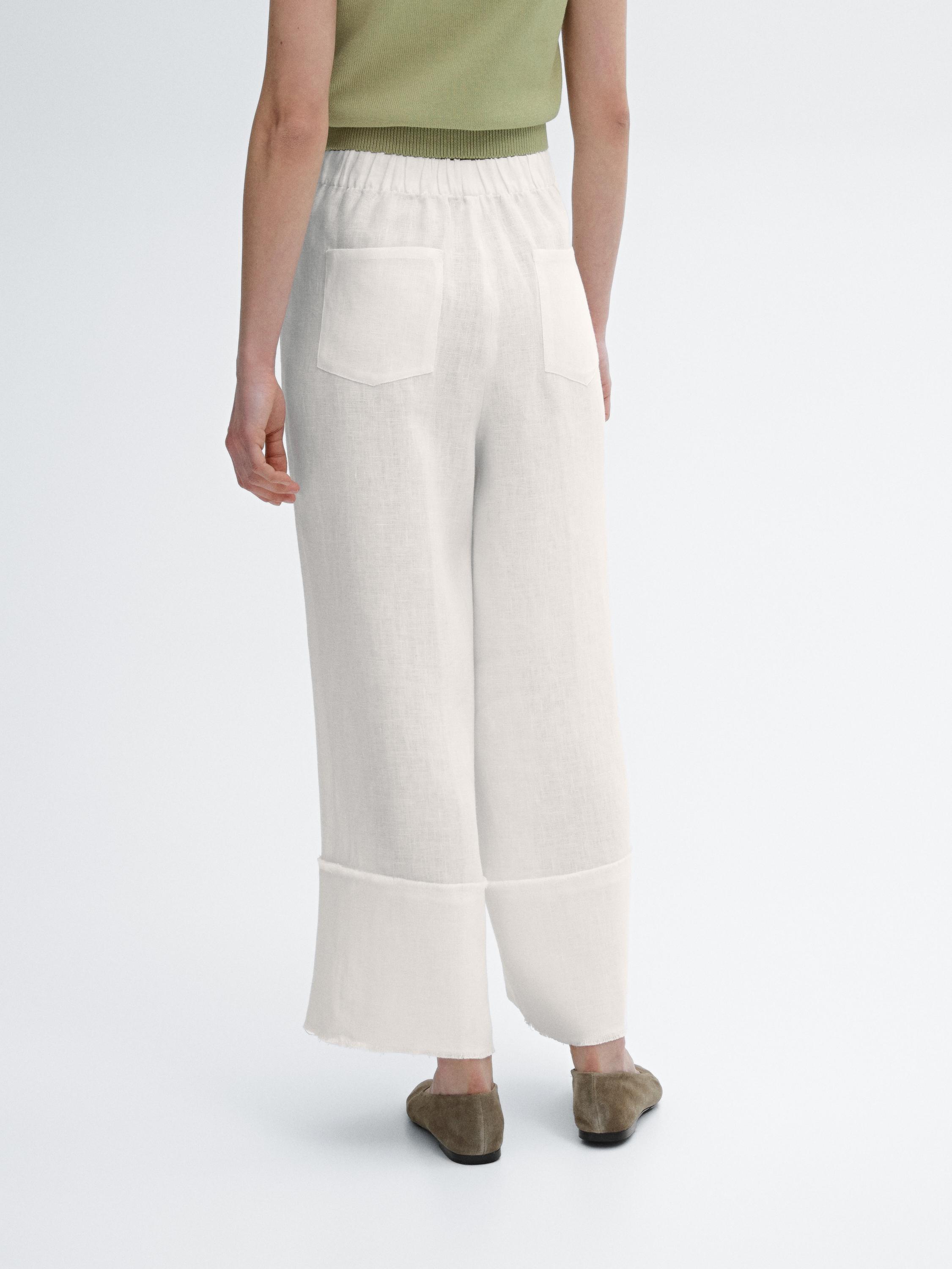 Wide leg trousers with flared detail