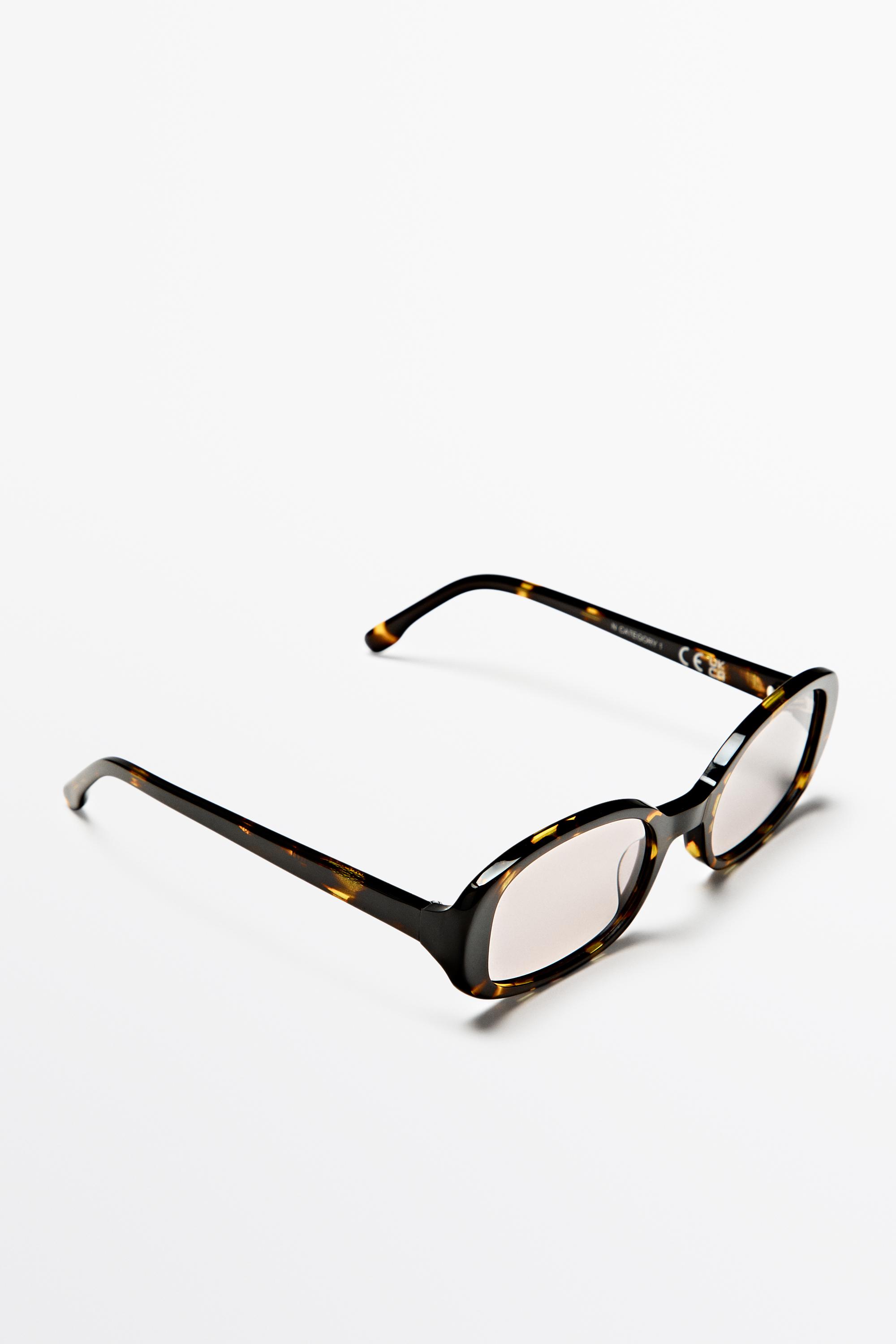 Oval tortoiseshell-effect sunglasses — BROWN
